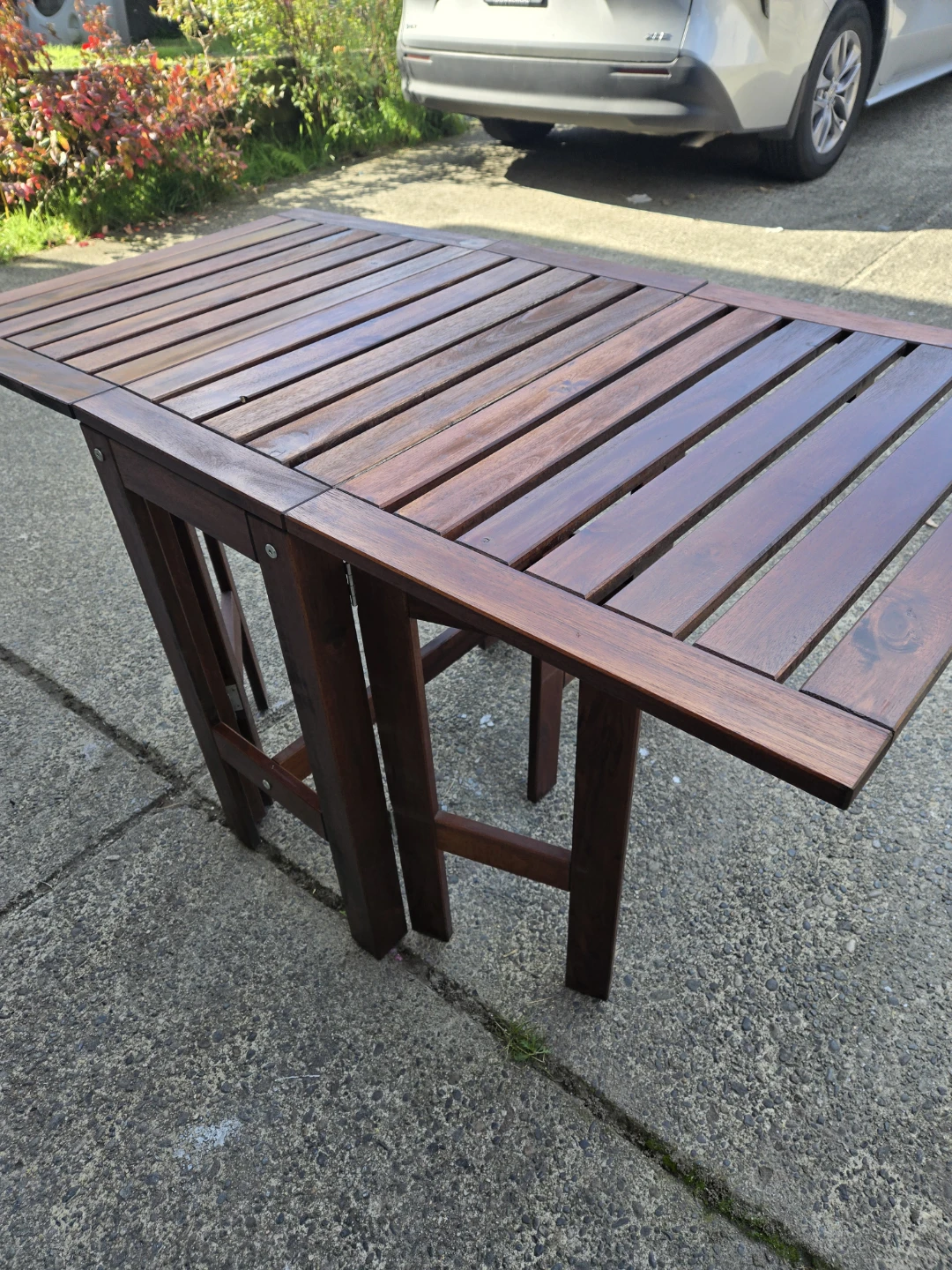 Newly refinished ikea solid wood applaro folding patio table