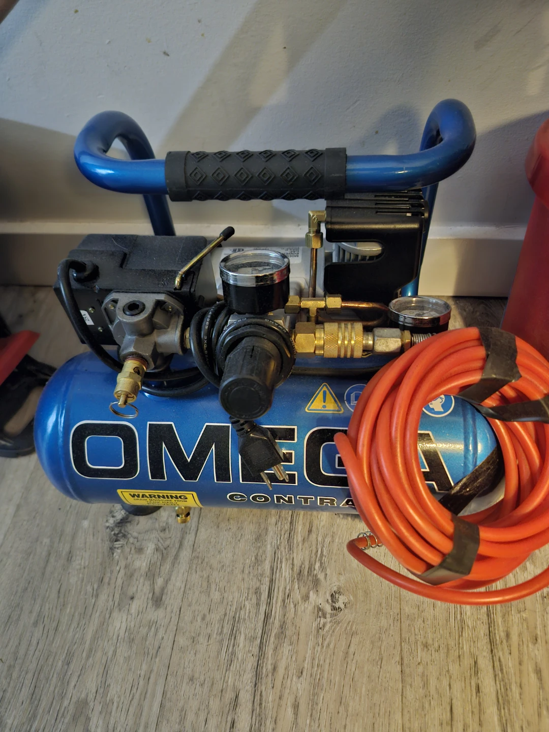 Omega Contractor Air Compressor PN1004L and staple guns.