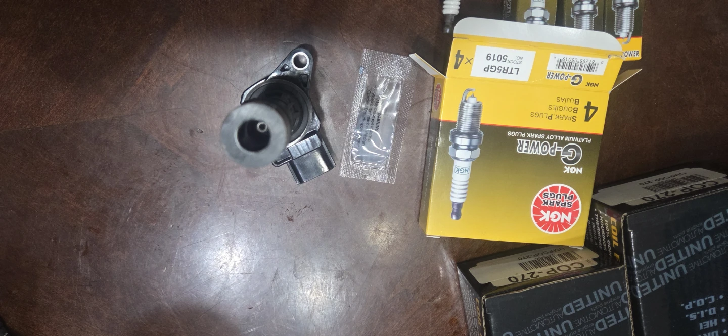 2006 mazda 3 ignition coils and spark plugs - photo 4