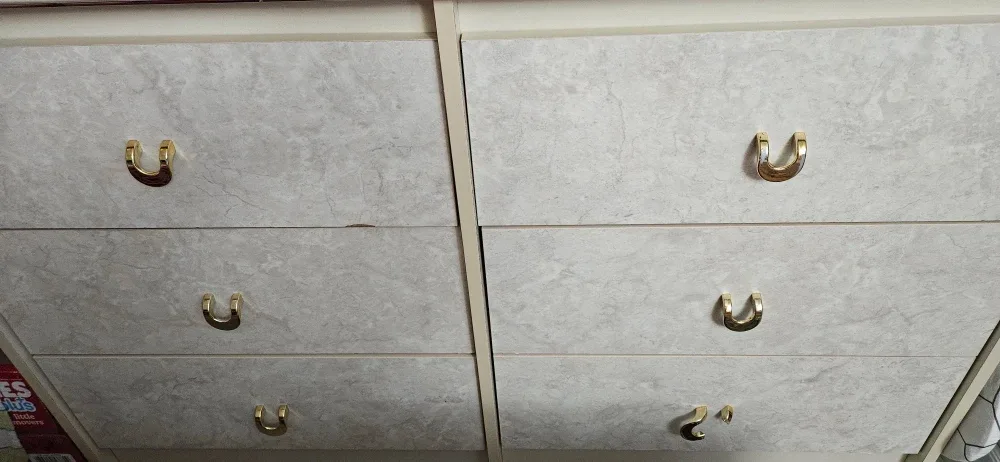 Marble-Look Dresser with Gold Handles and Marble-look Nightstand image indicator(4)