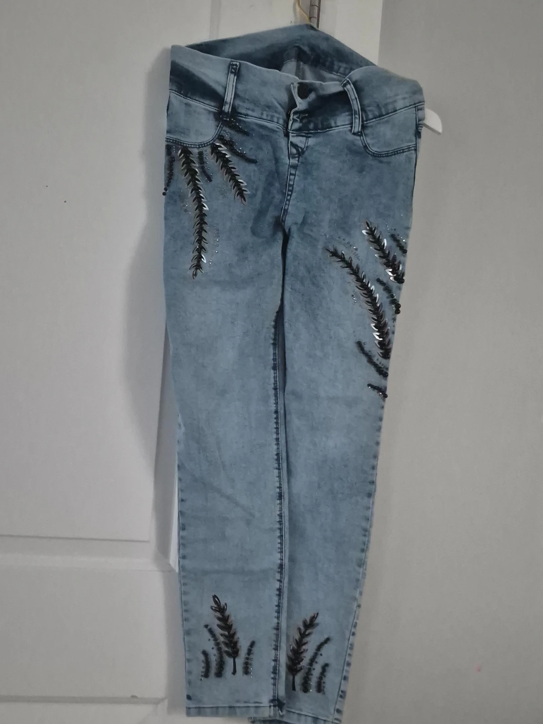 Light Wash Jeans with Leafy Embellishments
