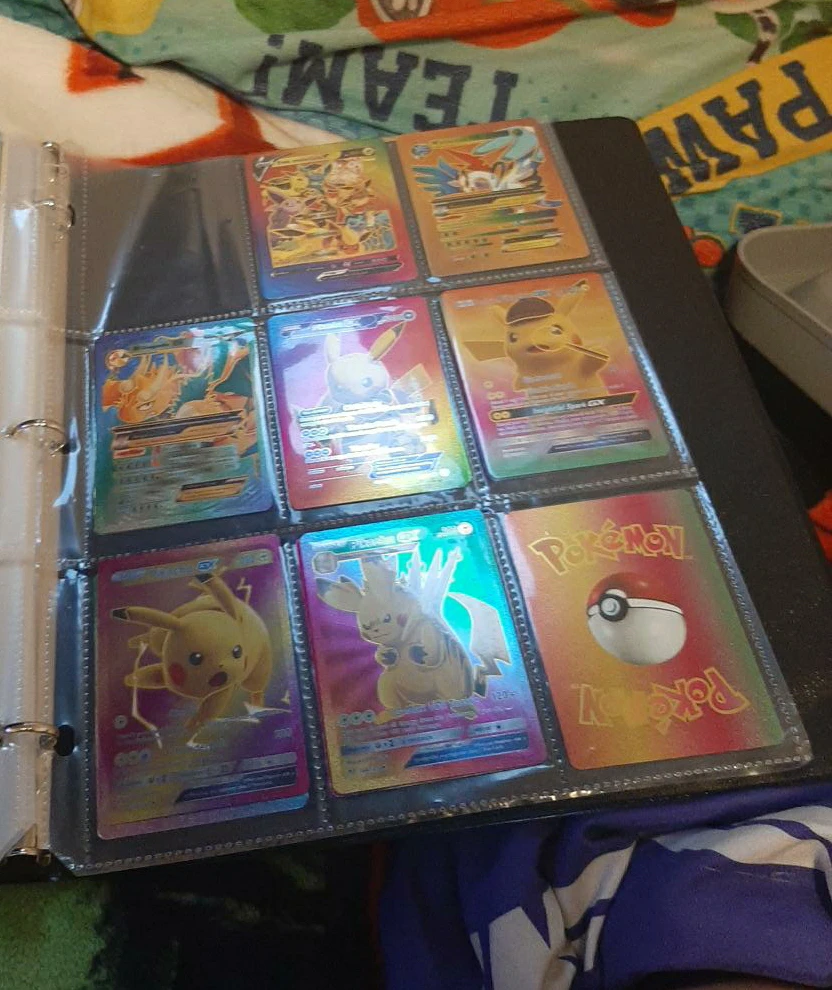 Assorted Trading Cards in Binder