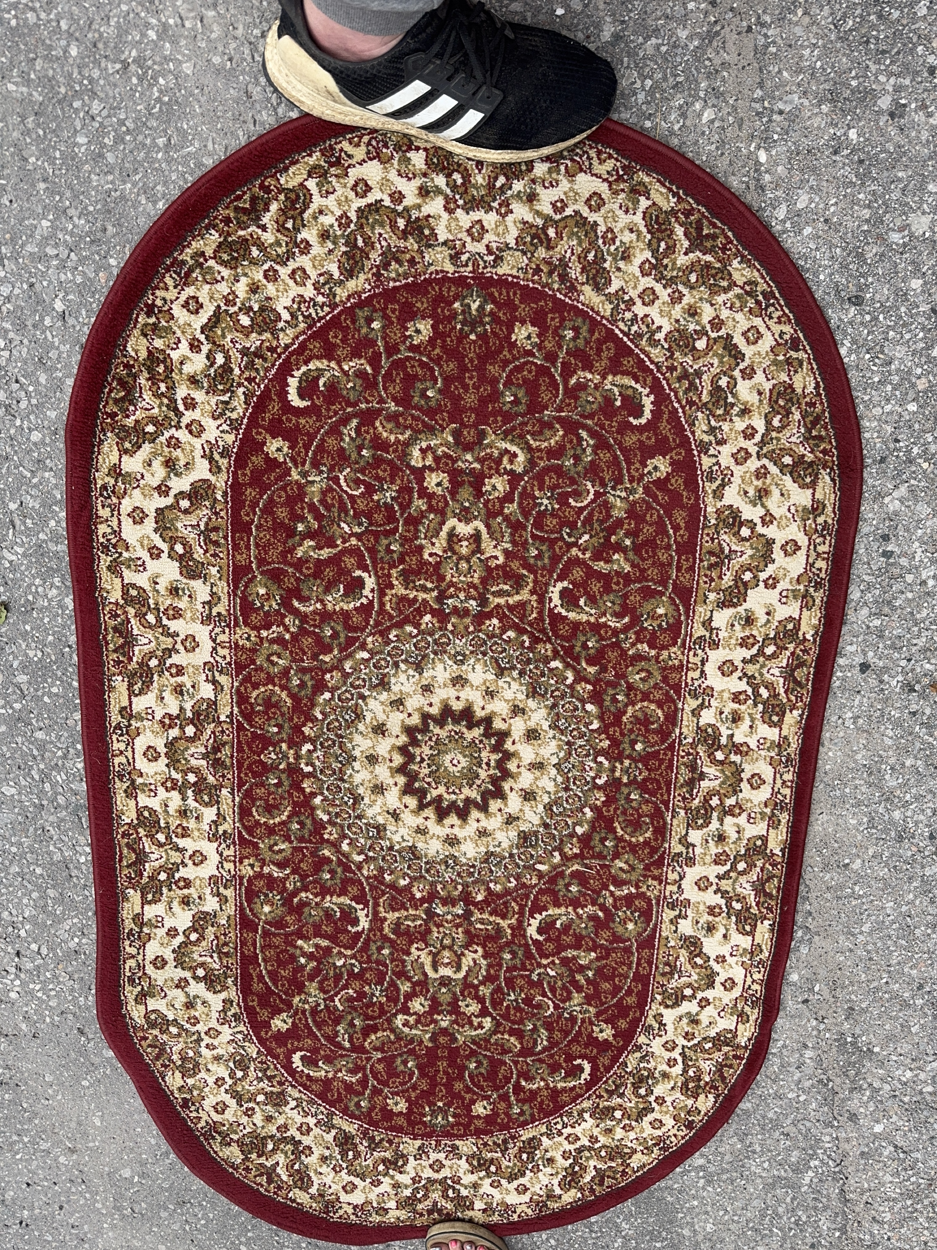 Oval Red and Beige Area Rug thumbnail
