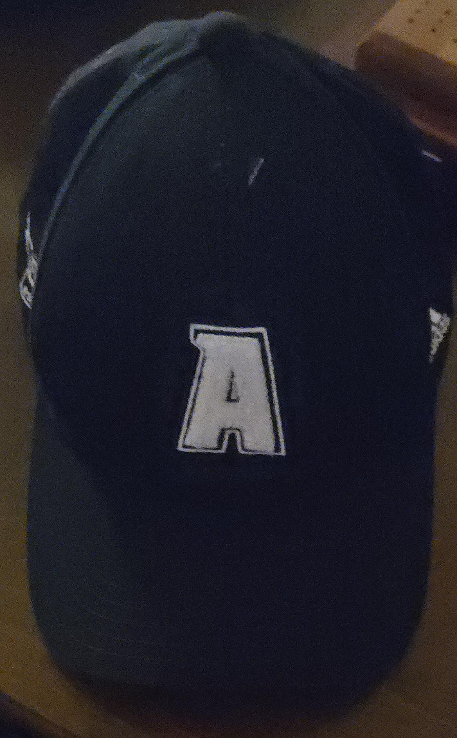Dark-coloured baseball cap with letter A thumbnail