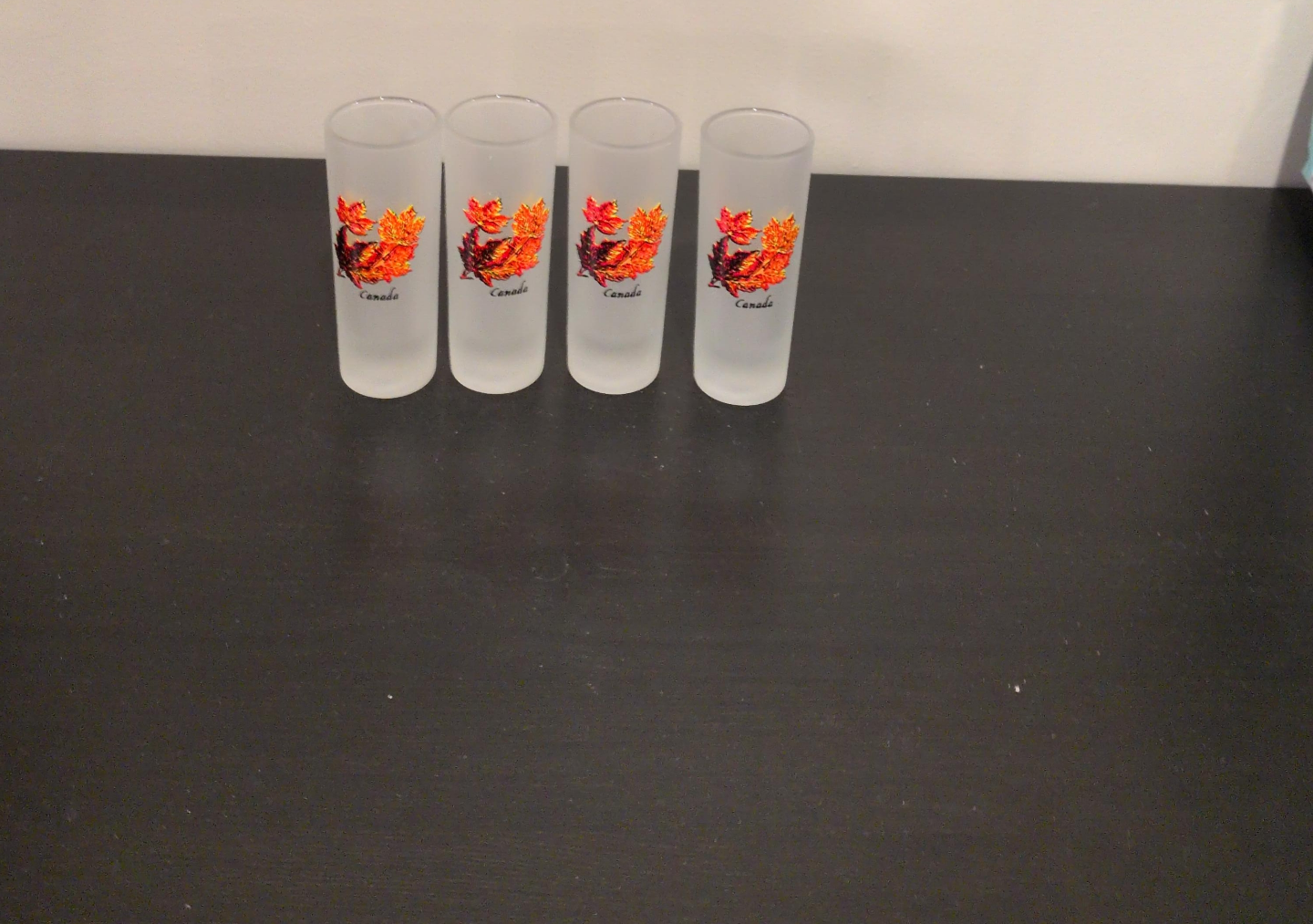 Set of 4 Frosted Shot Glasses with Maple Leaf Design - Canada