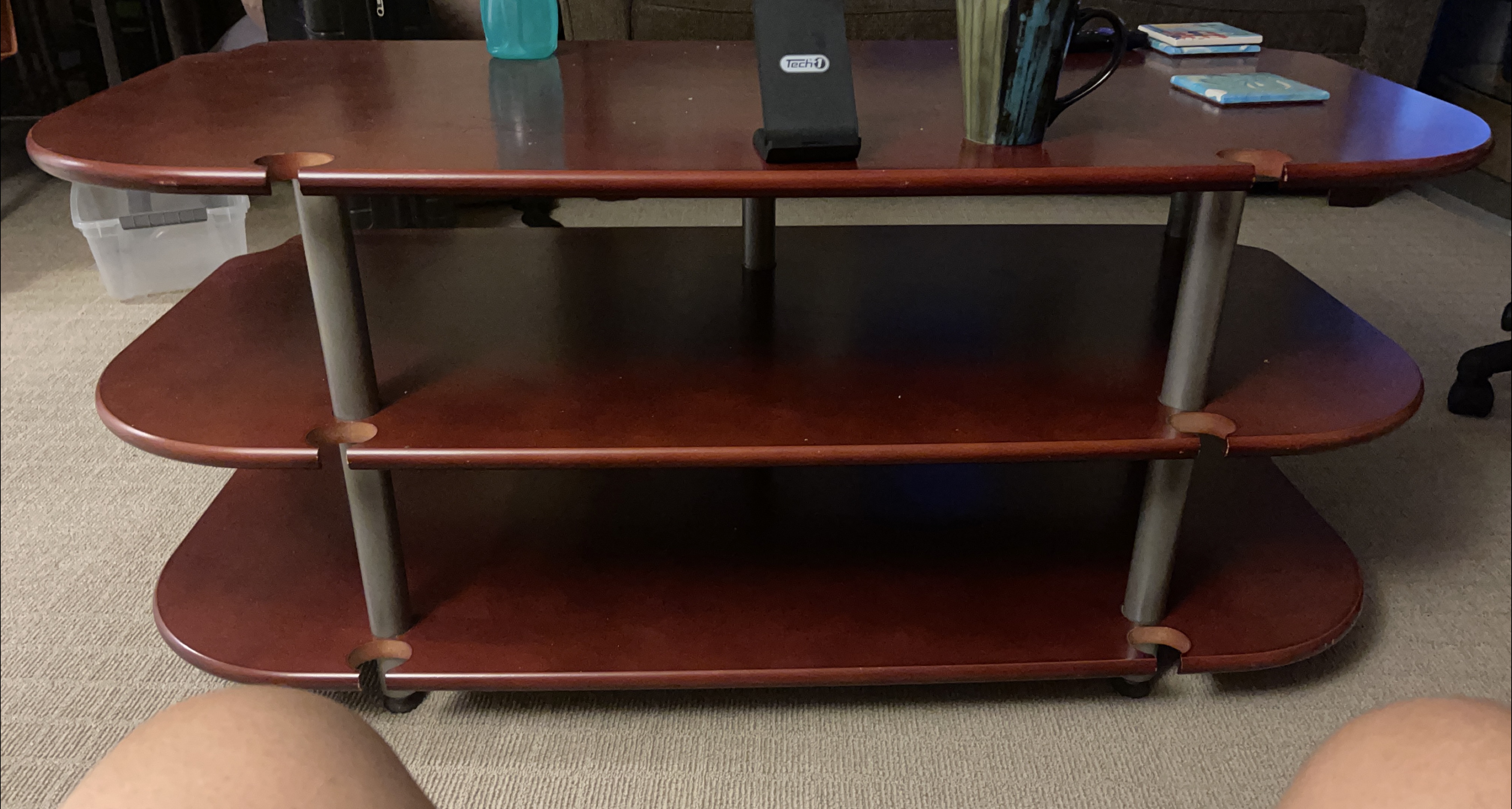 Reddish-Brown Oval Coffee Table with Shelves thumbnail
