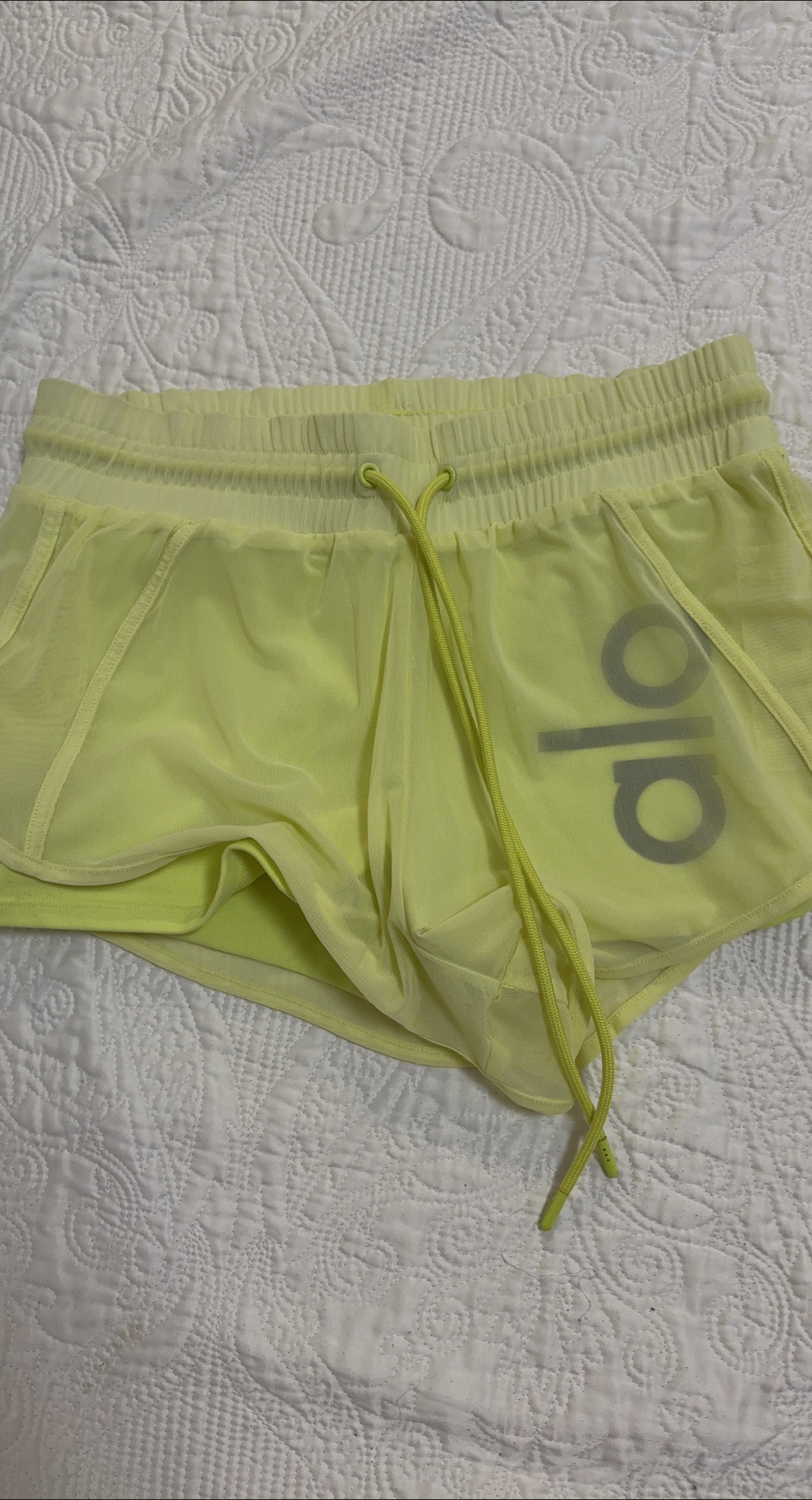 ALO Yellow Mesh Shorts