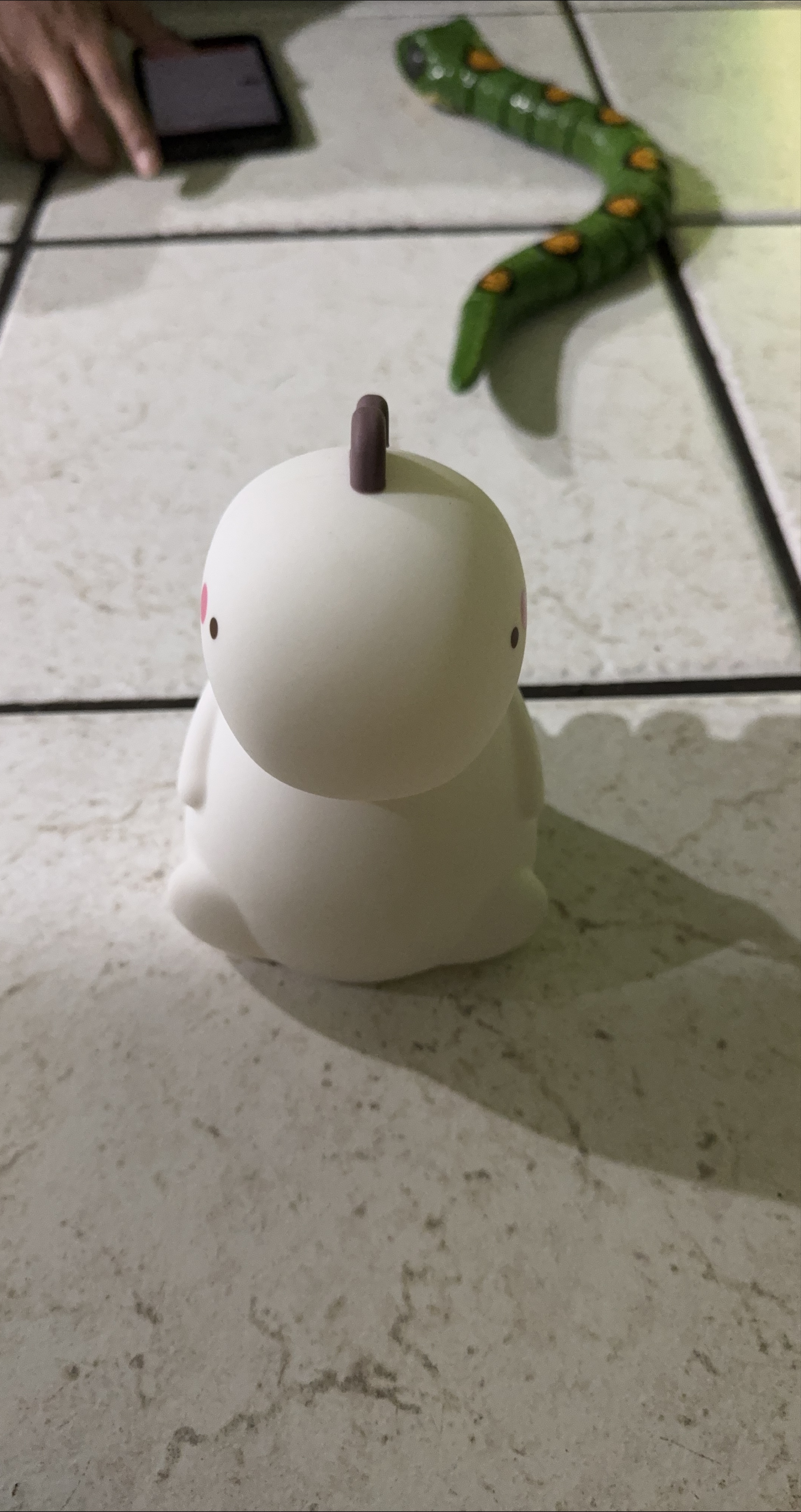 Adorable dinosaur-shaped night light thumbnail