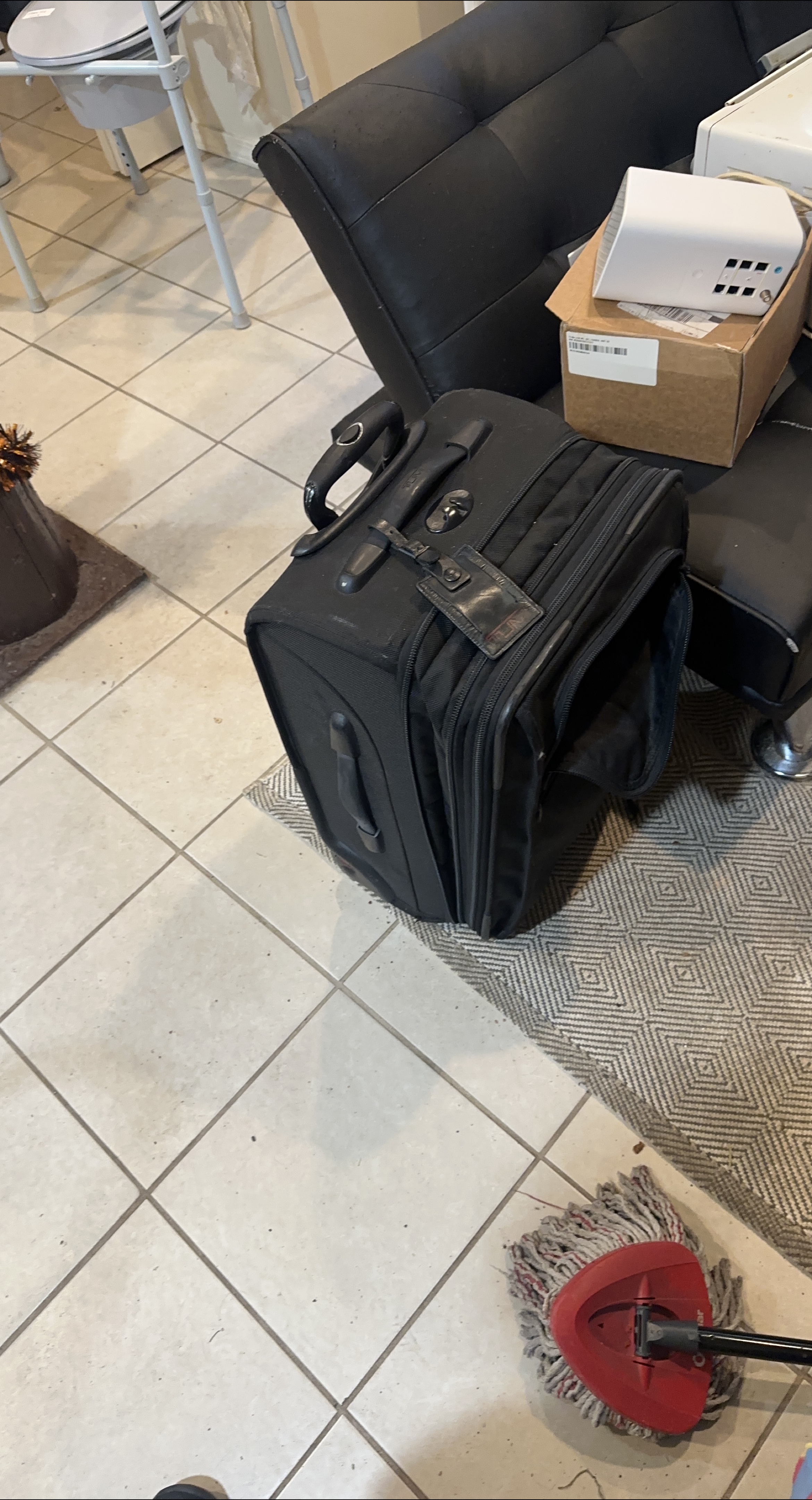 Tumi Black Rolling Suitcase thumbnail