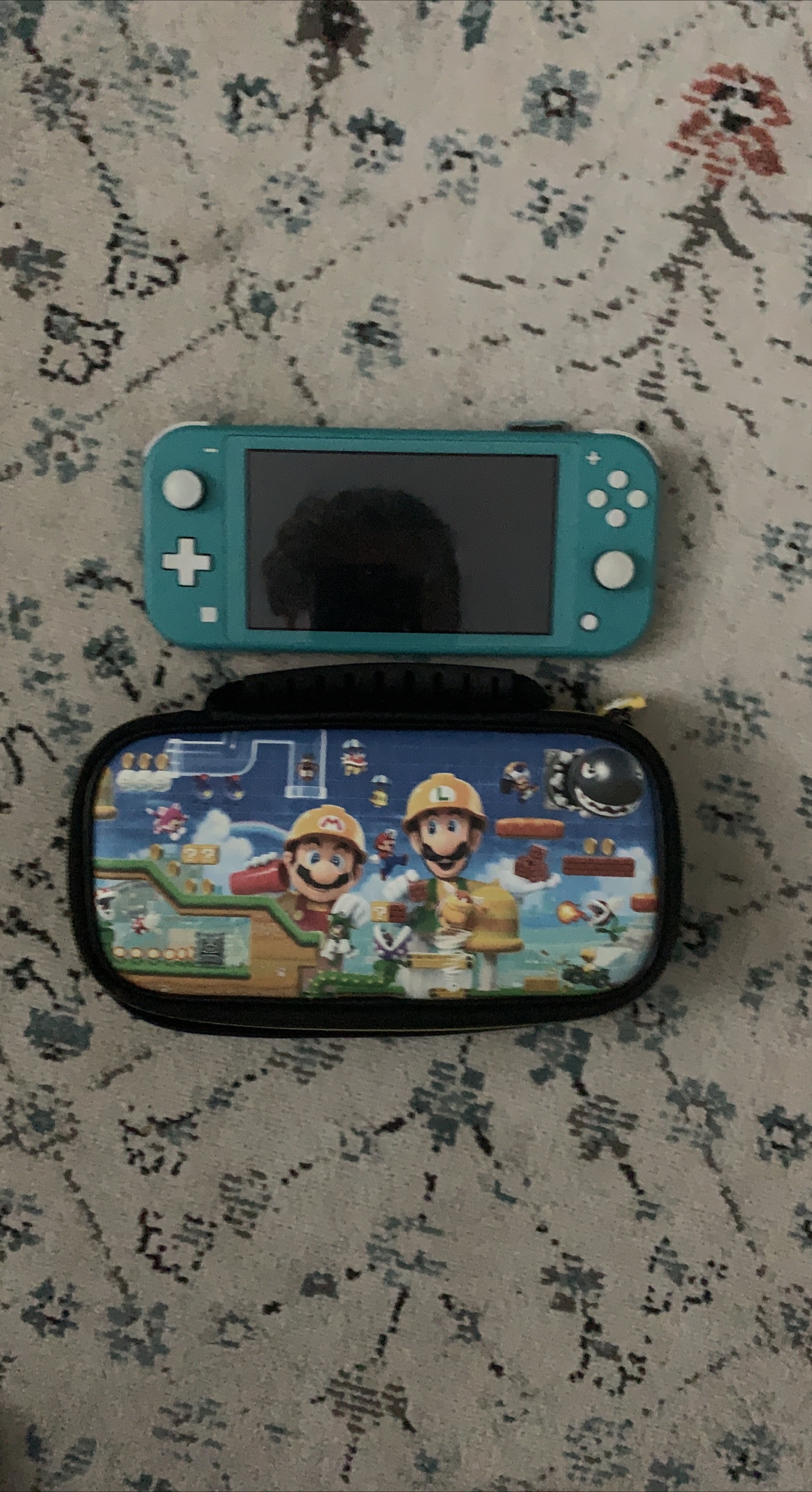 Nintendo Switch Lite Turquoise with Mario Case thumbnail