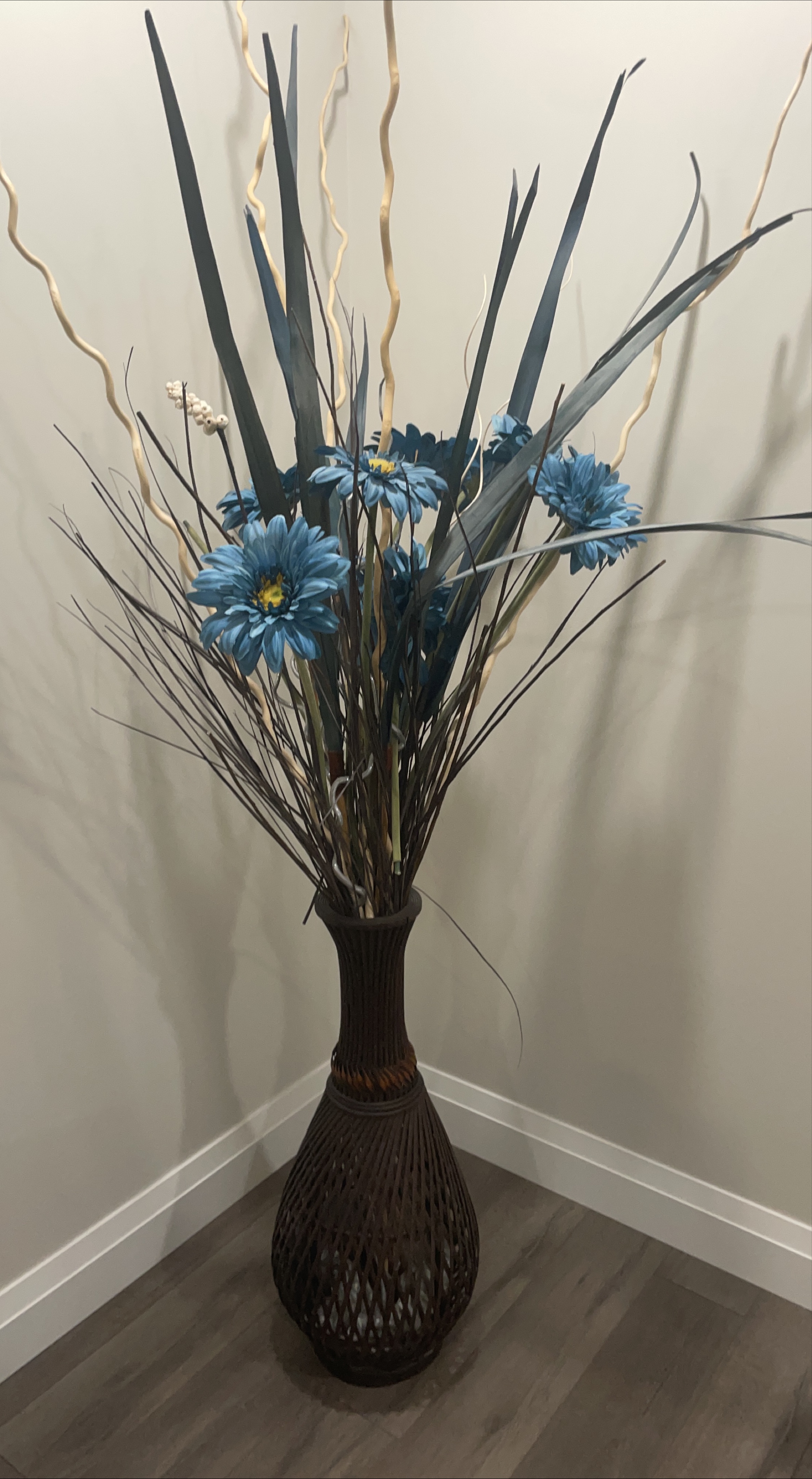 Artificial Floral Arrangement in Wicker Vase
