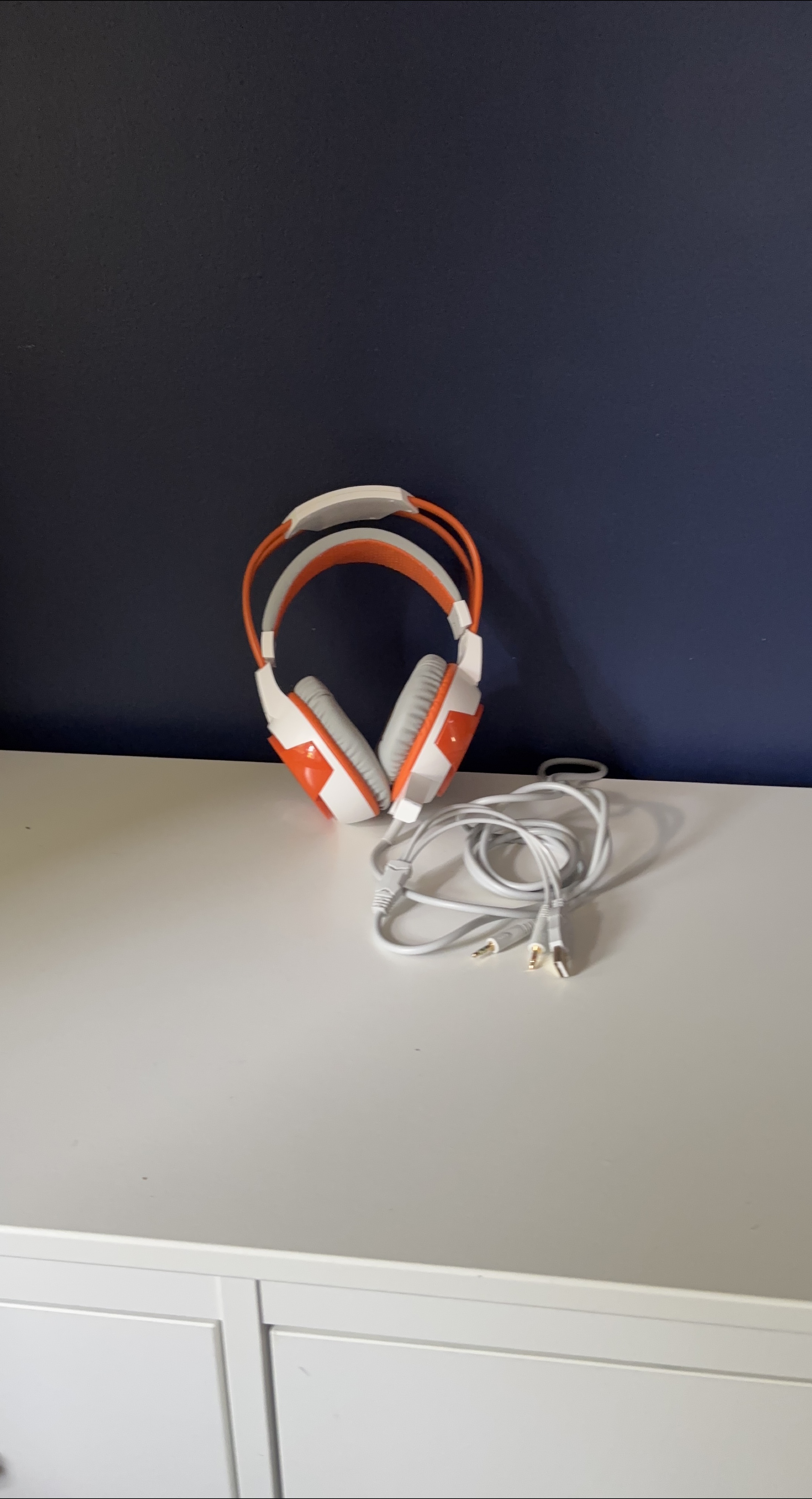 Orange and white headphones thumbnail