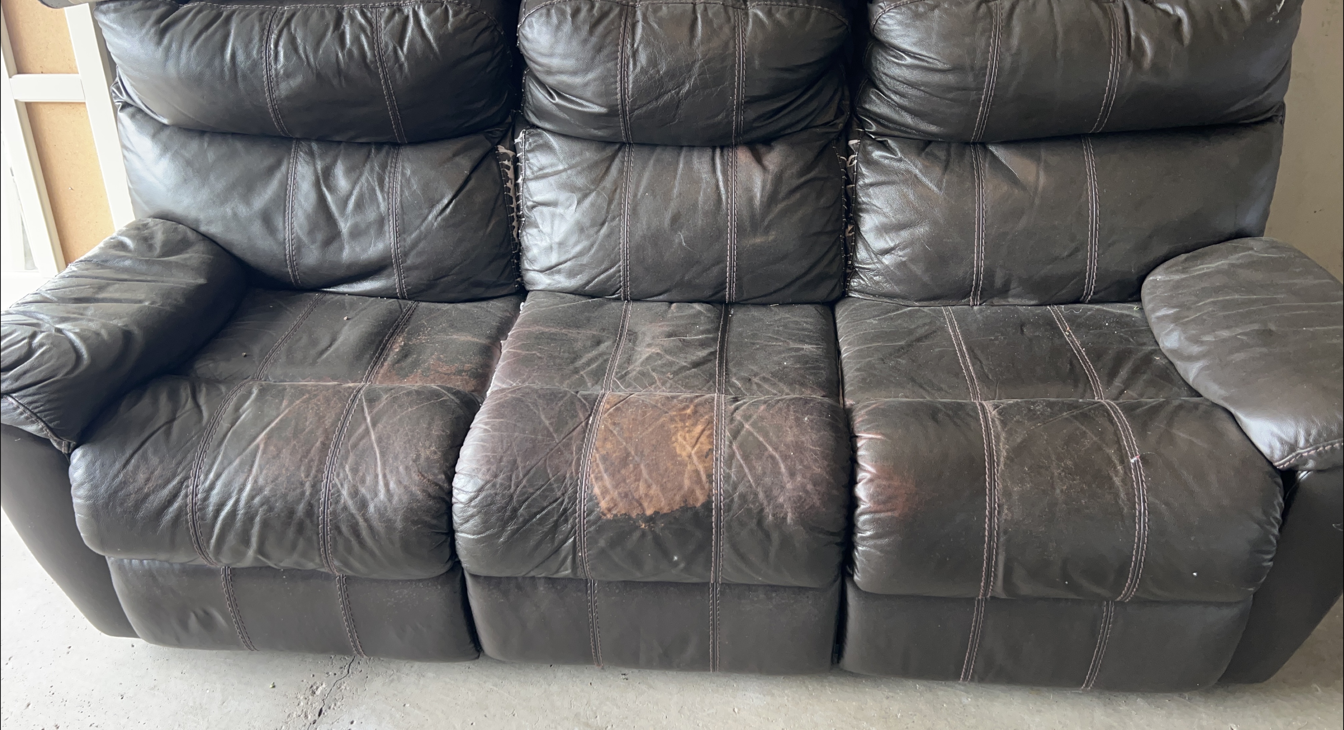 Brown Leather Reclining Sofa