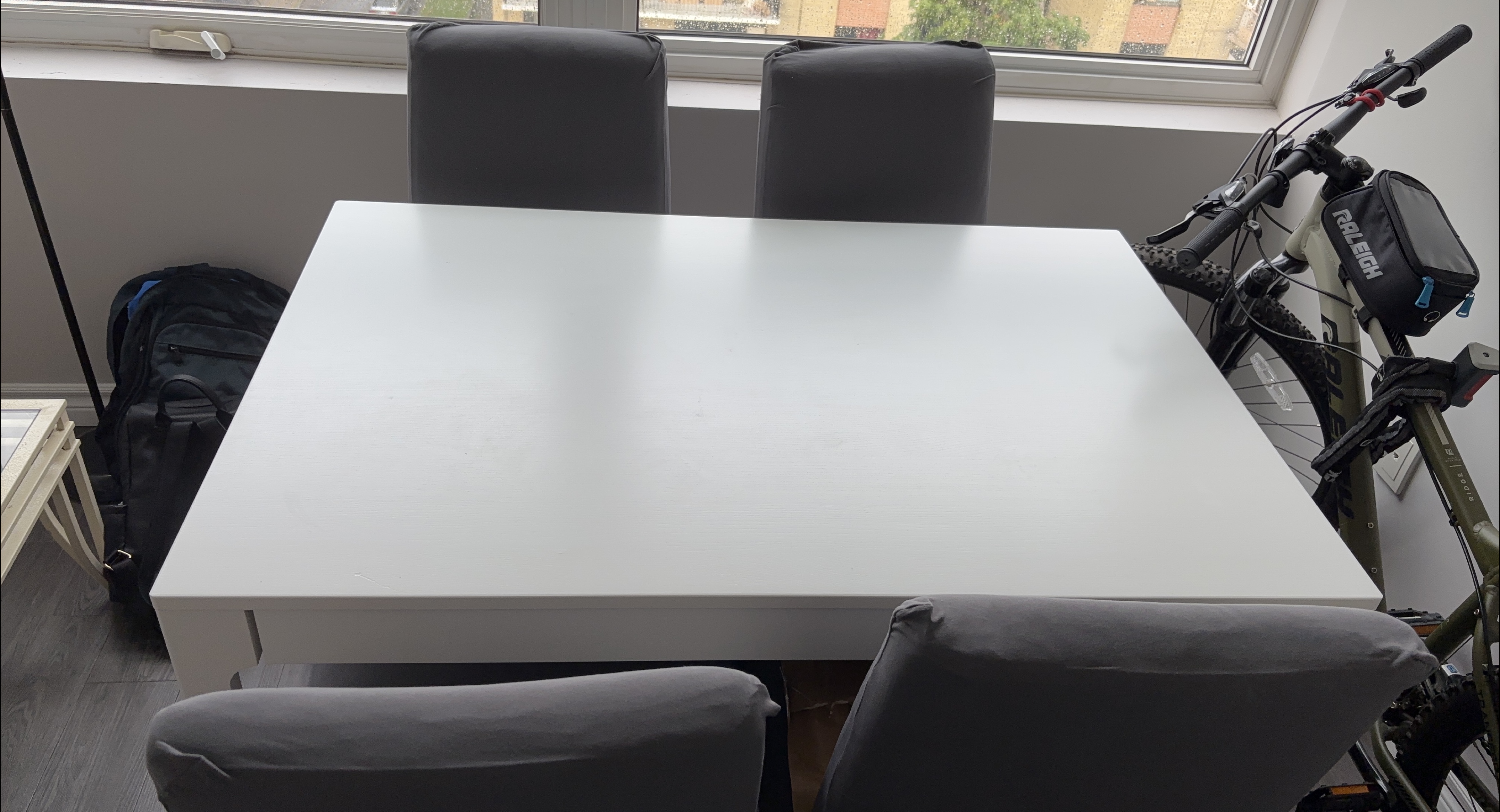 Extendable White Dining Table IKEA with Grey Chairs