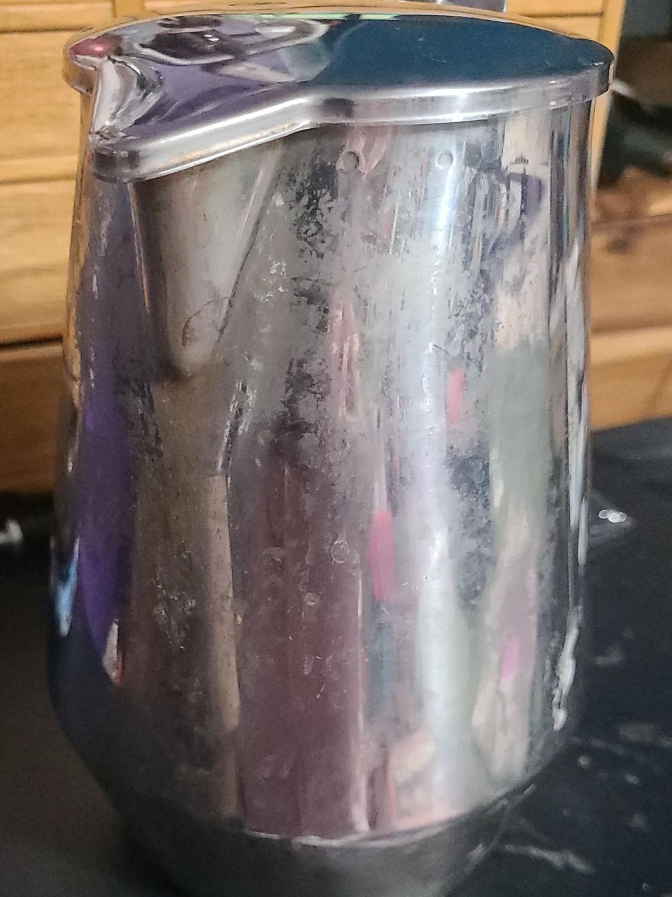 Used Metal Pitcher