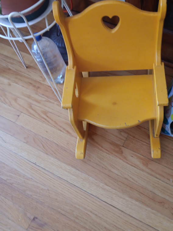 Yellow Wooden Rocking Chair with Heart Detail thumbnail