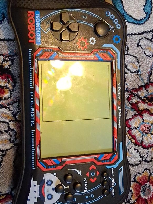 Vintage Robot Technology Handheld Game thumbnail