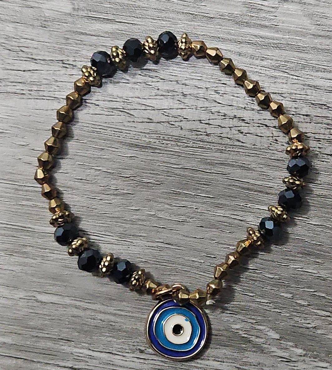 Gold and Black Beaded Bracelet with Evil Eye Charm thumbnail