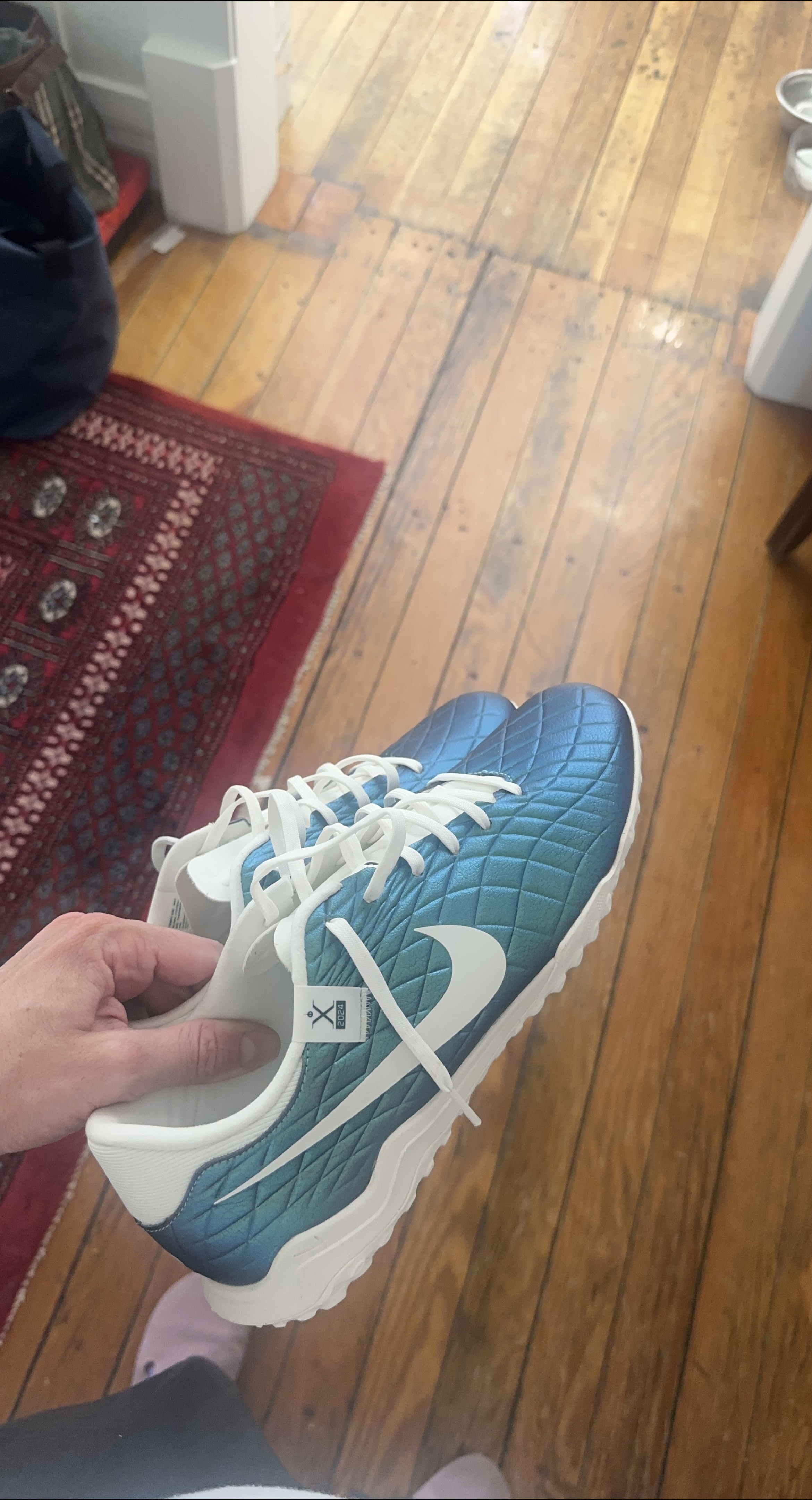 Nike NOCTA Glide Blue Quilted Sneakers image indicator(1)