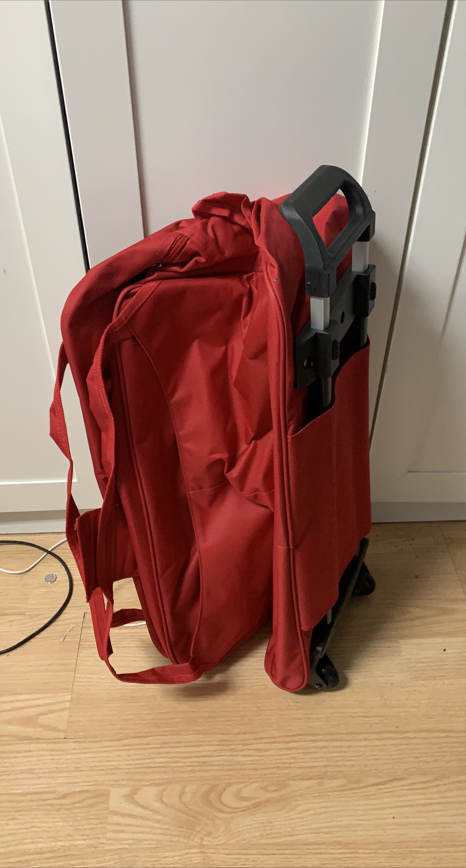 NEW Red duffle bags with wheels. thumbnail