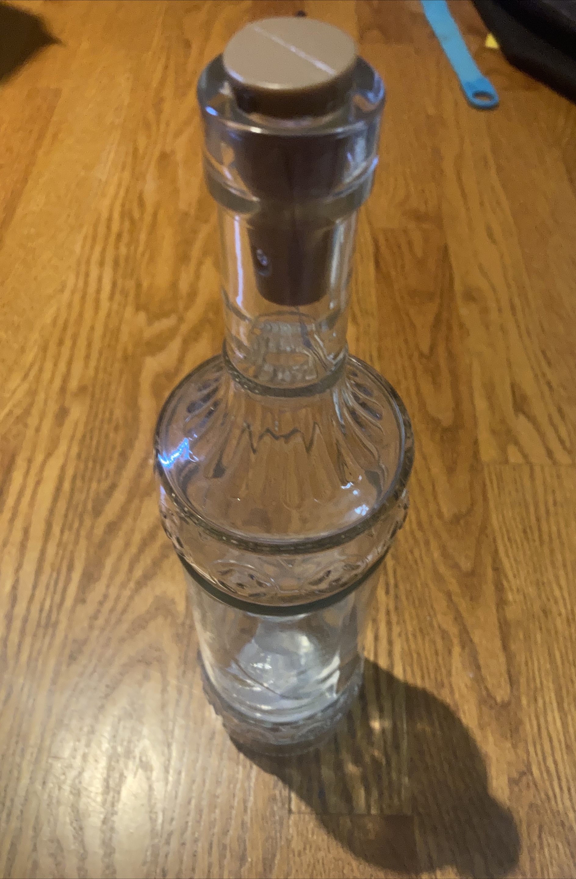 Clear Glass Bottle with Stopper and a light thumbnail