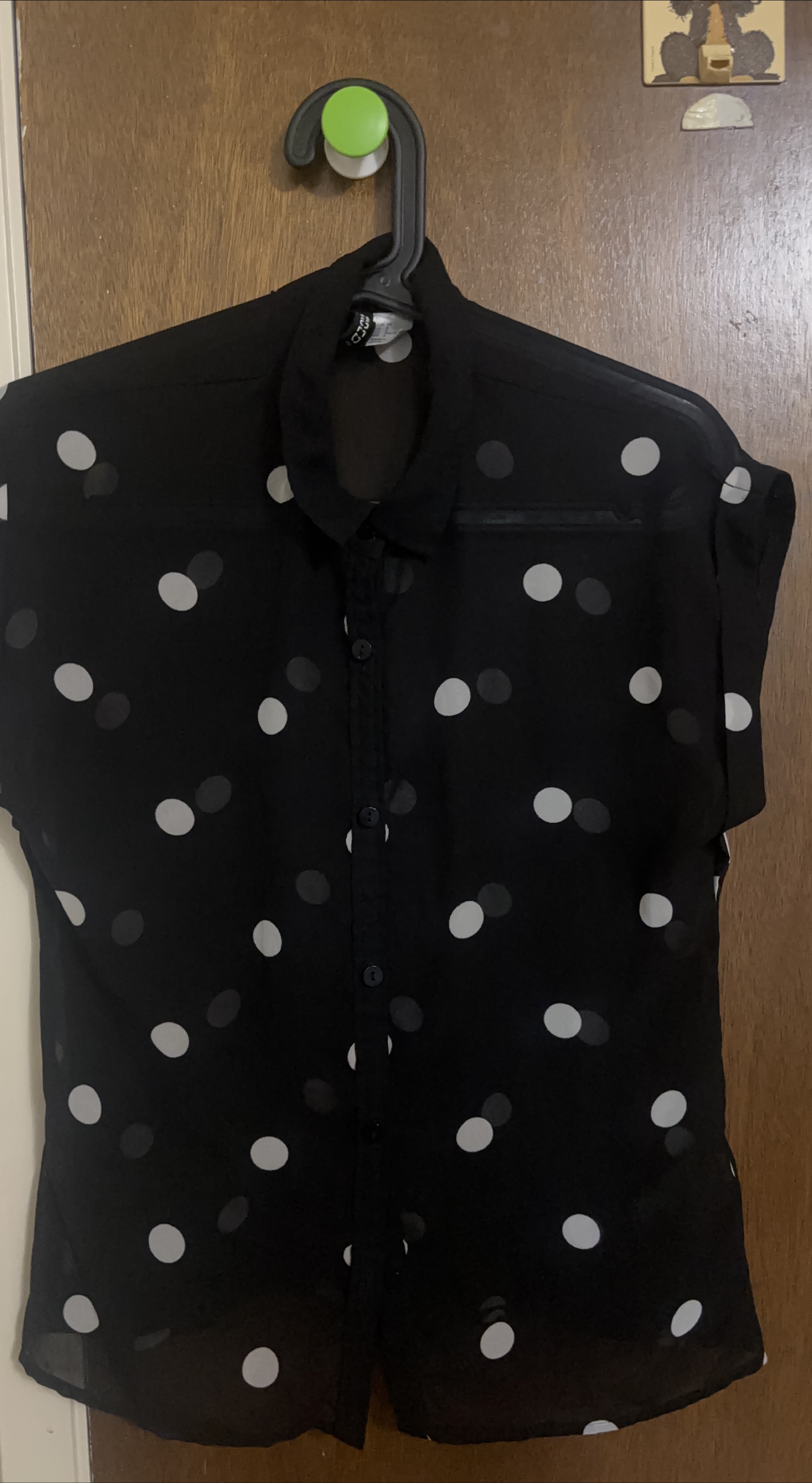 Black polka dot shirt