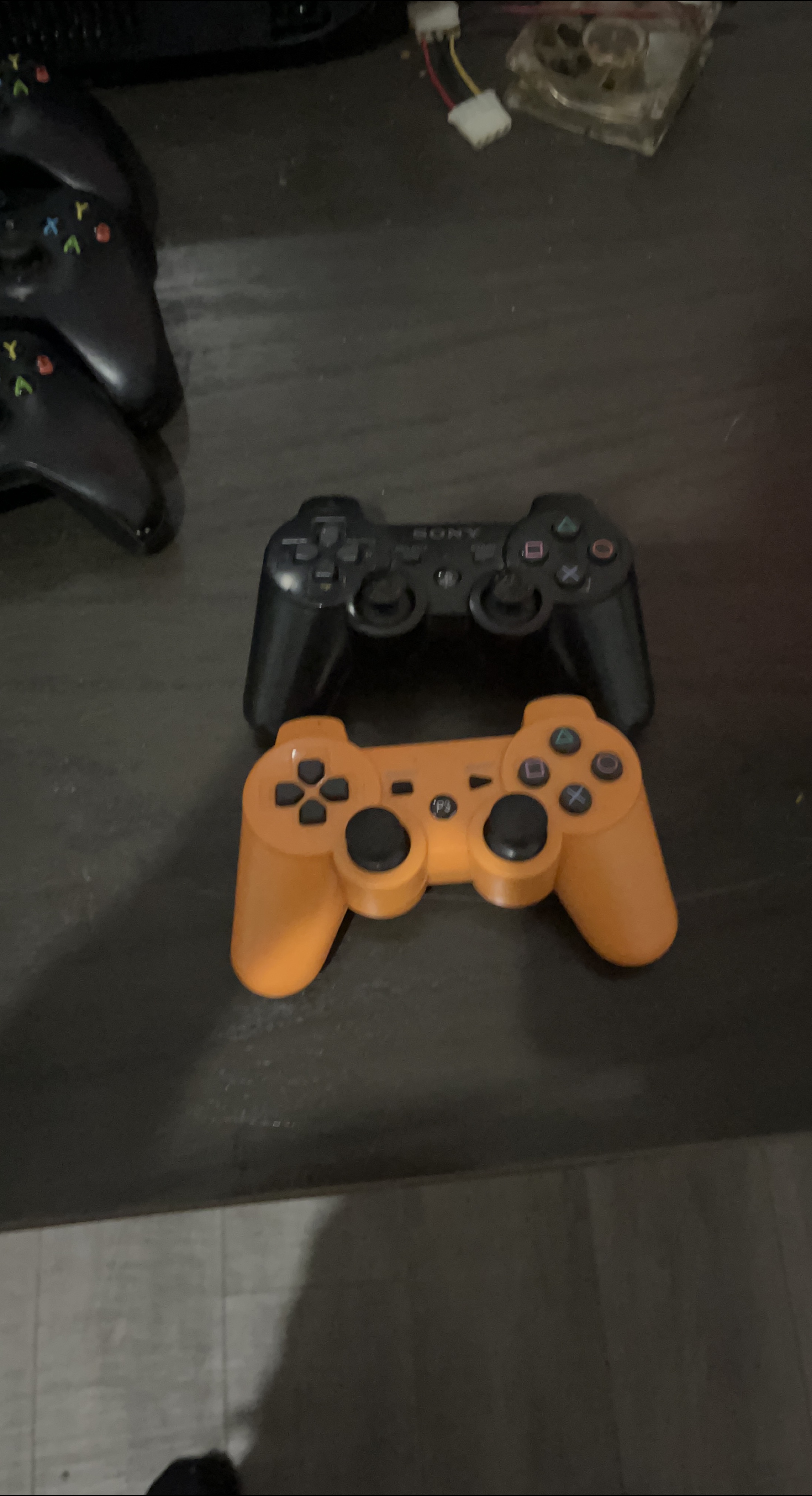 Sony PS3 Controllers - Black & Orange thumbnail