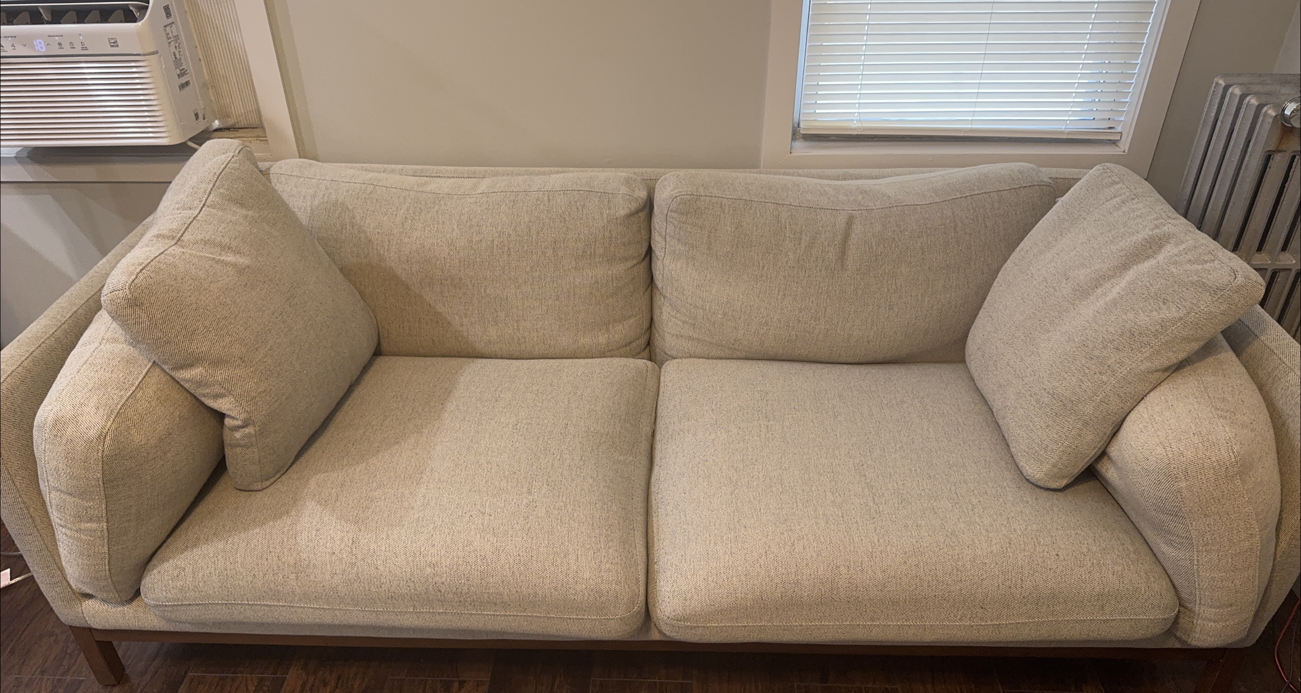 Beige Sofa Couch with Pillows thumbnail