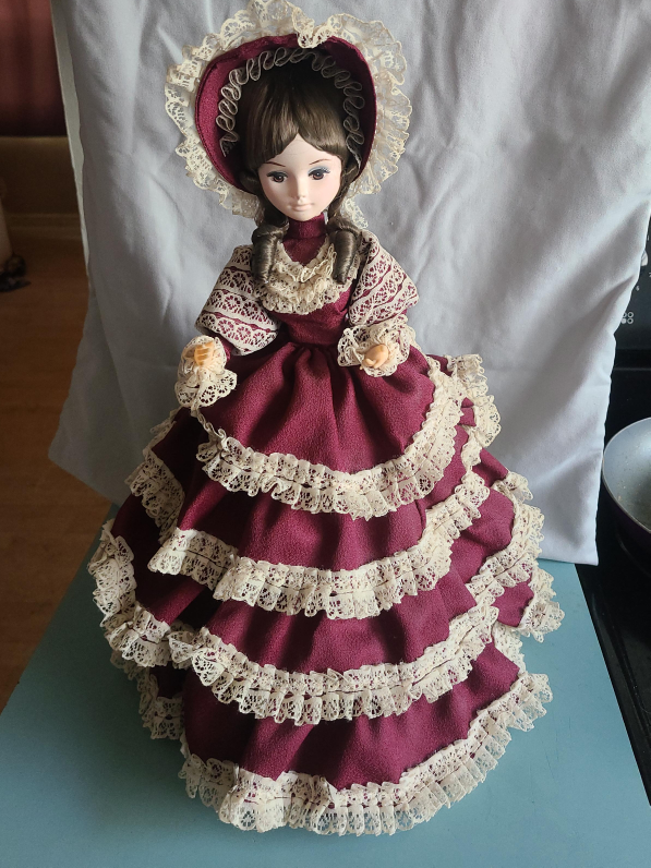 Vintage Doll in Burgundy Dress thumbnail