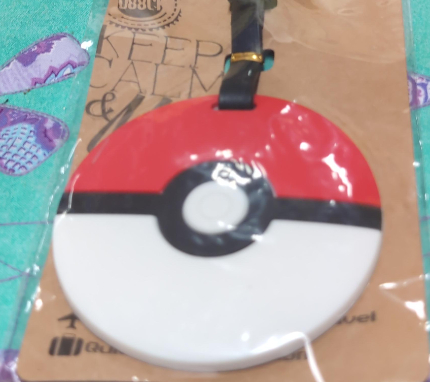 One brand new pokémon luggage tag and purse thumbnail