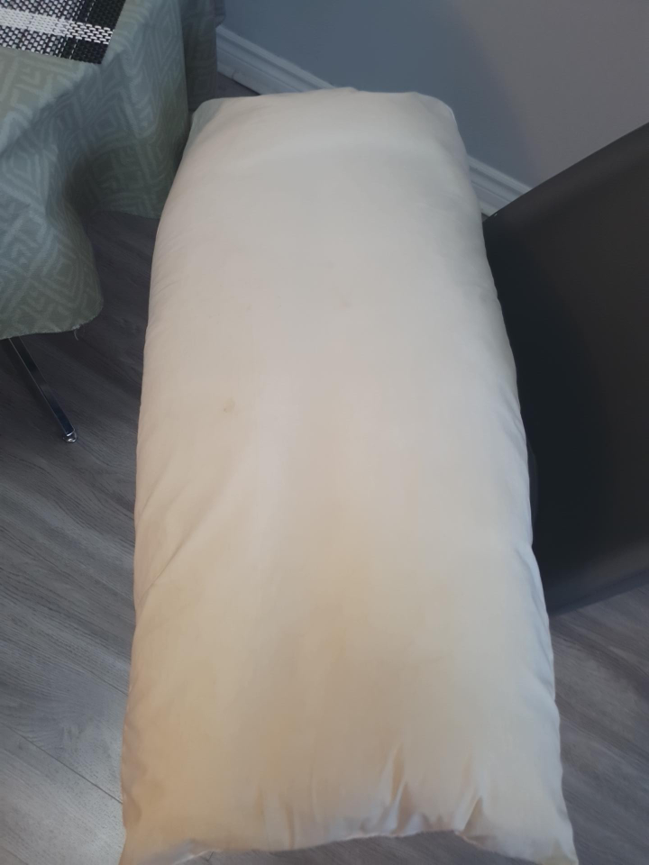 Cream coloured body pillow