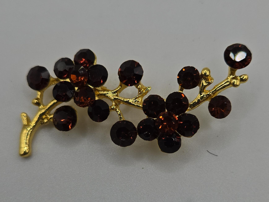 Gold-tone Floral Brooch with Red Rhinestones thumbnail