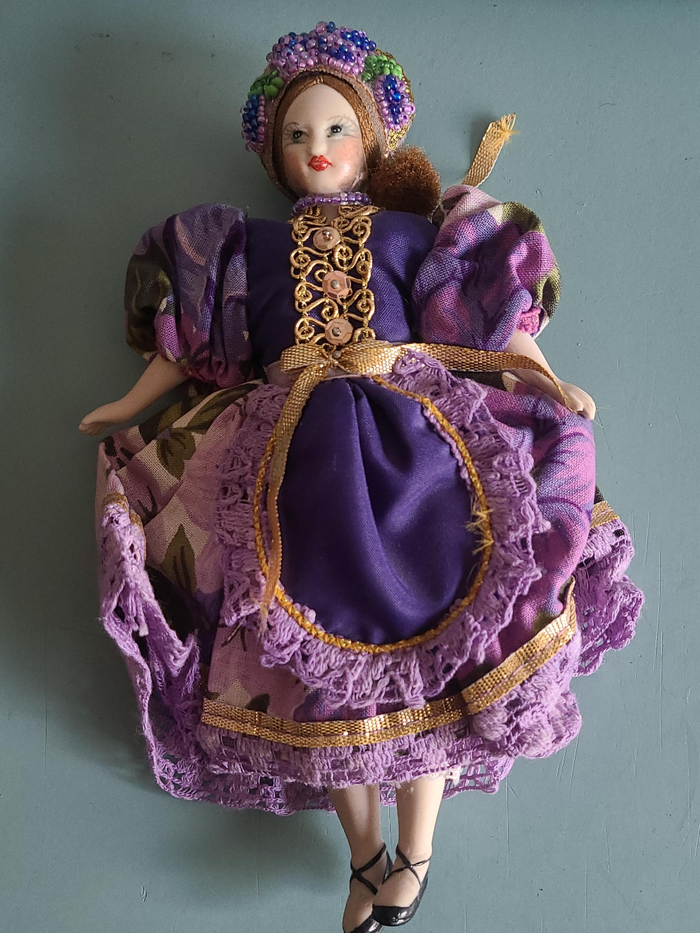 Porcelain Doll in Purple Dress thumbnail