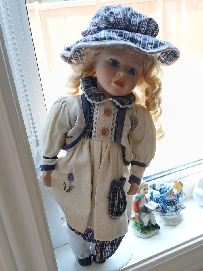Vintage Porcelain Doll with Plaid Hat thumbnail