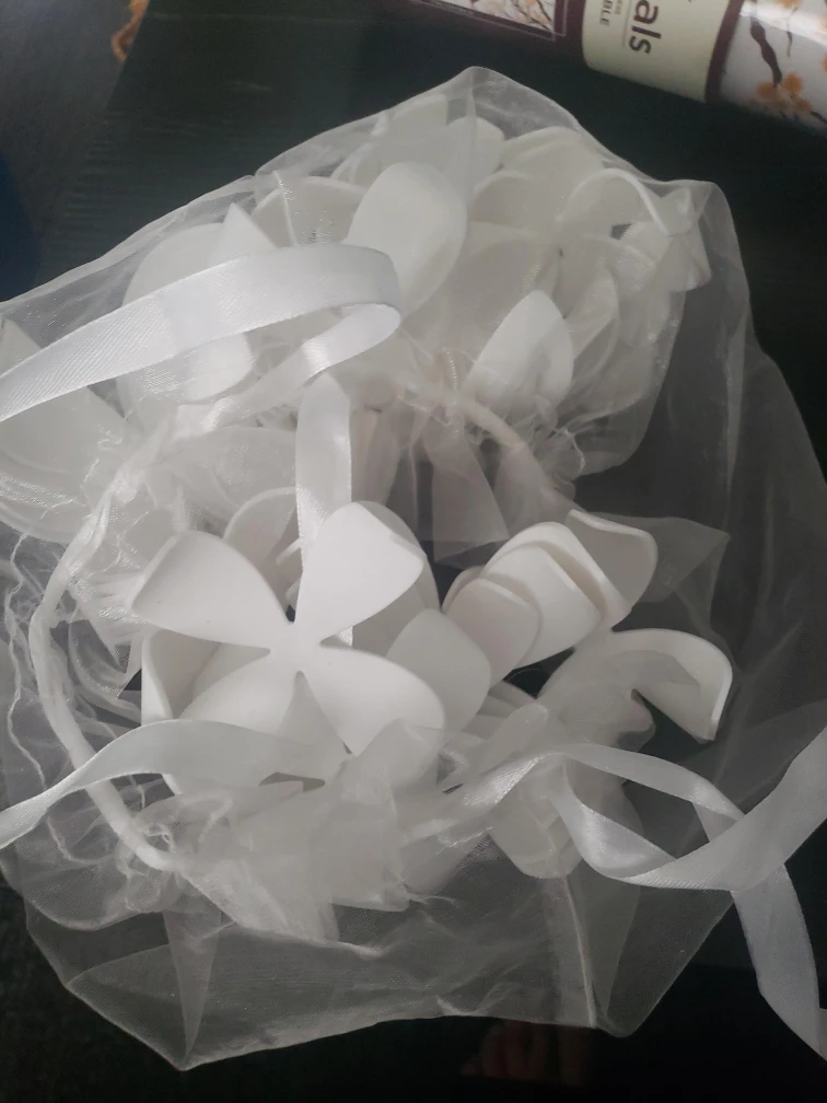 White Flower Decorations in Mesh Bag thumbnail