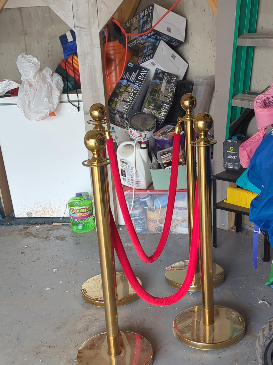 Gold Stanchions with Red Ropes