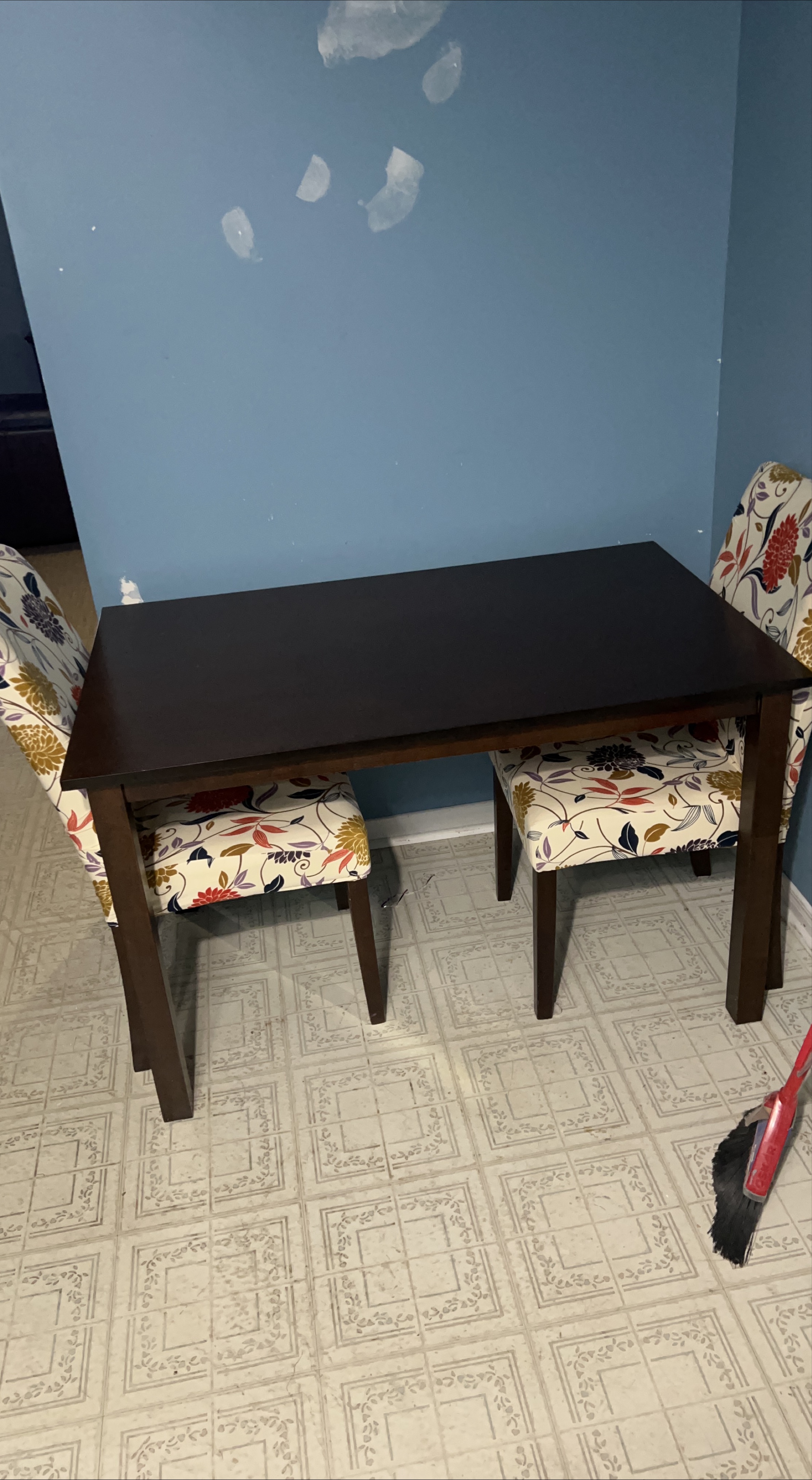 Dark Brown Dining Table with Floral Chairs