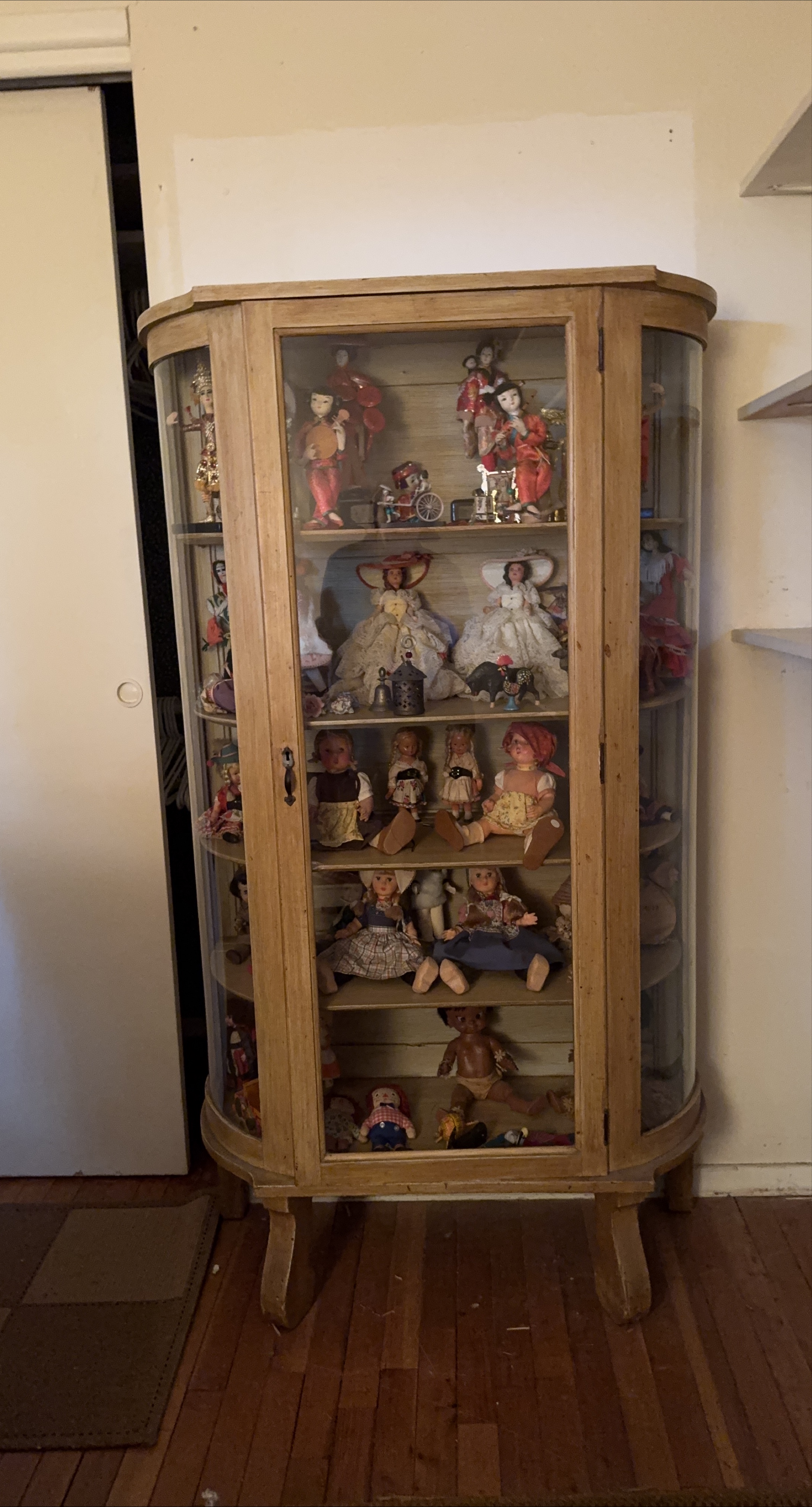 Display Cabinet with antique dolls from around the world thumbnail