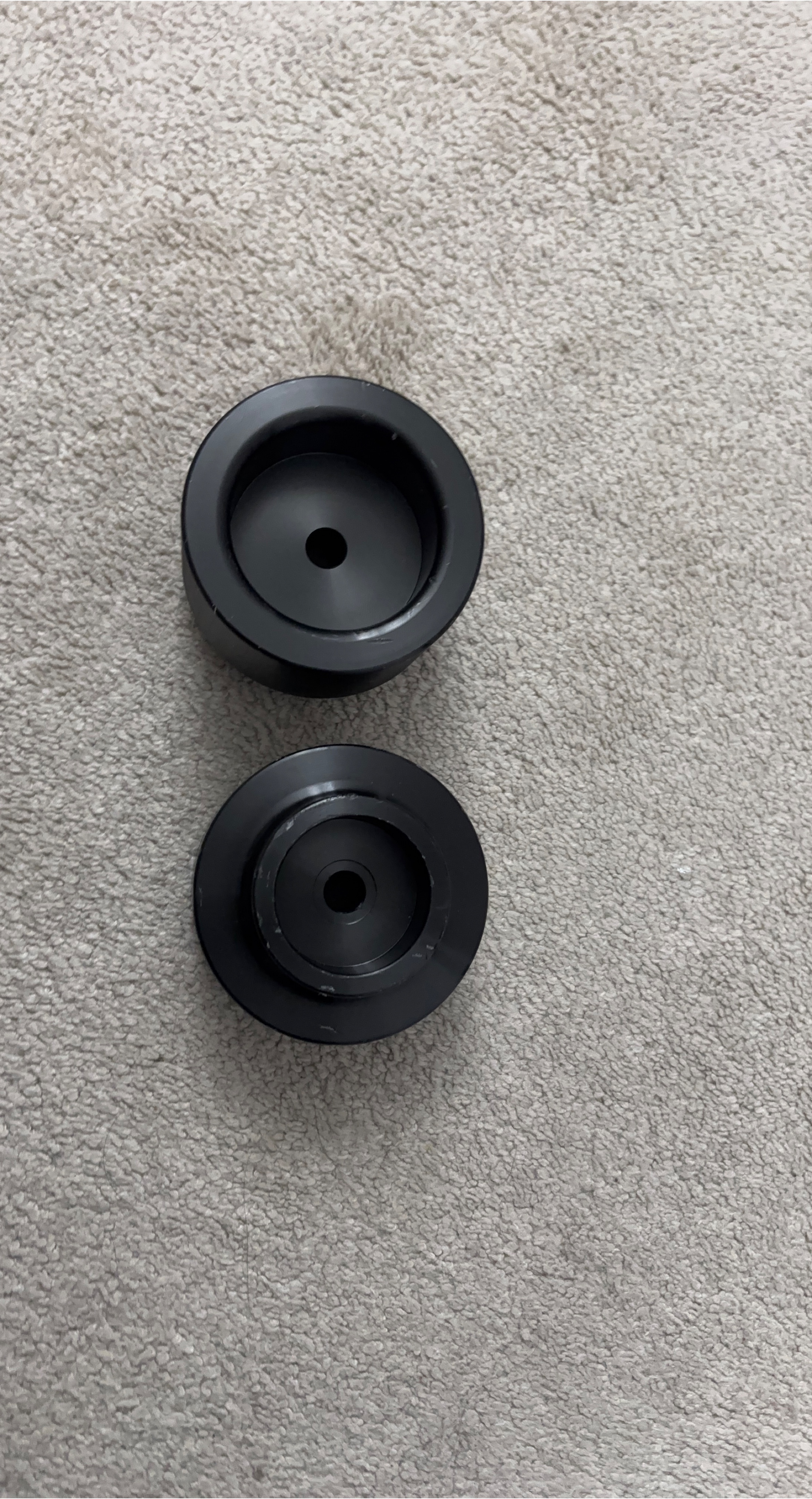 Two Black Plastic Wheels