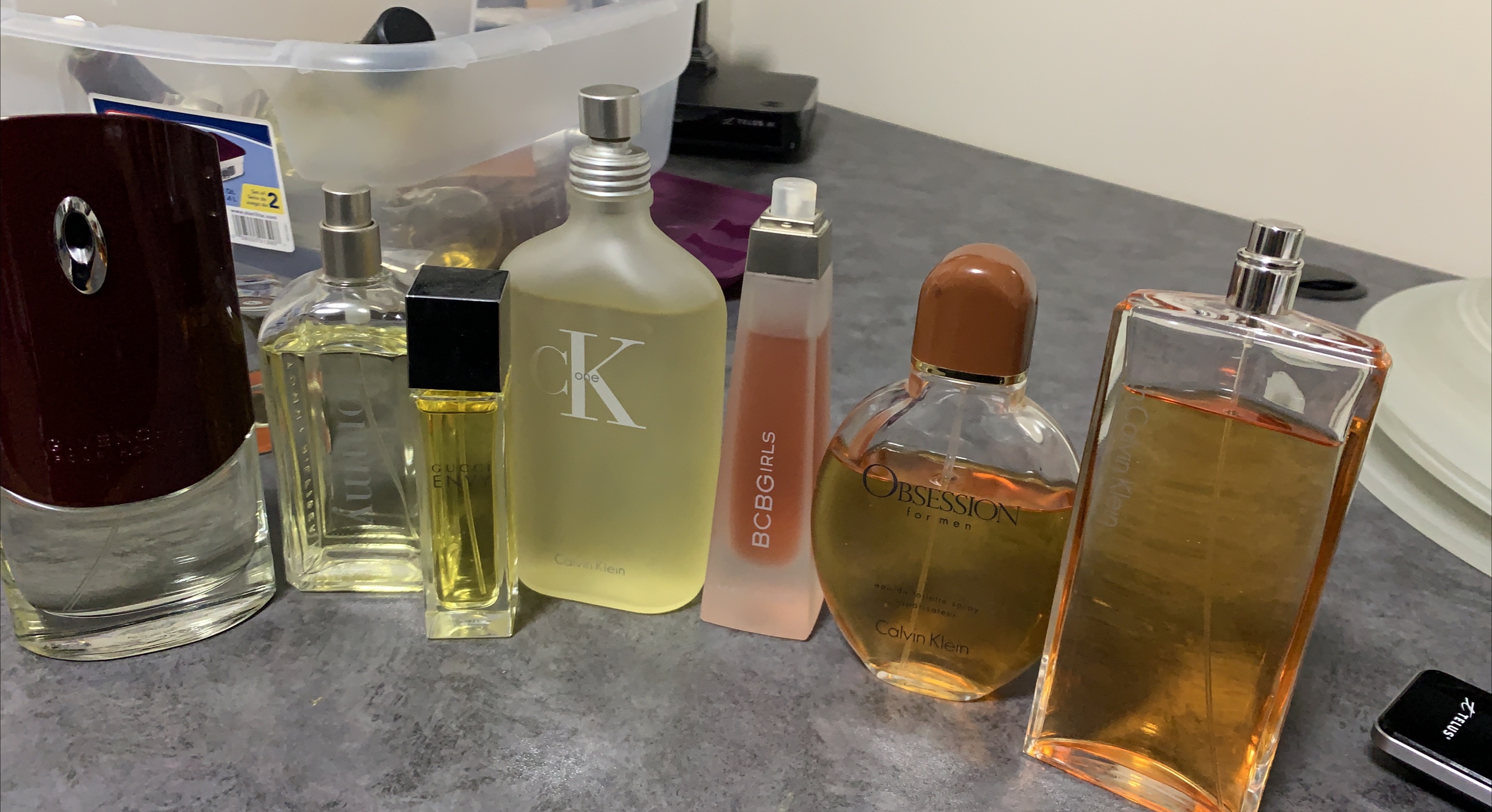 Assorted Perfume Bottles: Givenchy, Gucci, Calvin Klein image indicator(1)