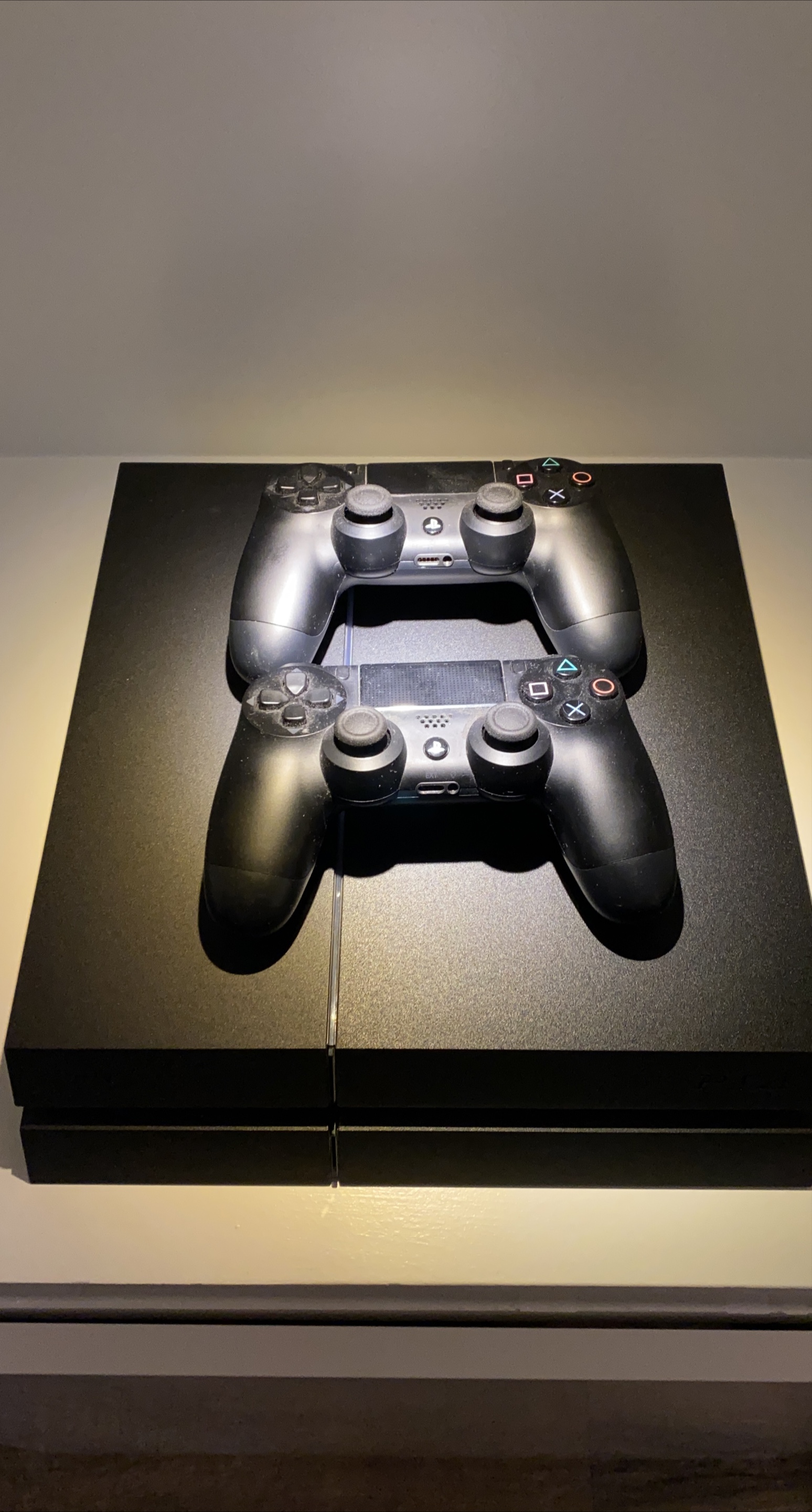 Sony PlayStation 4 Slim Console with Two Controllers