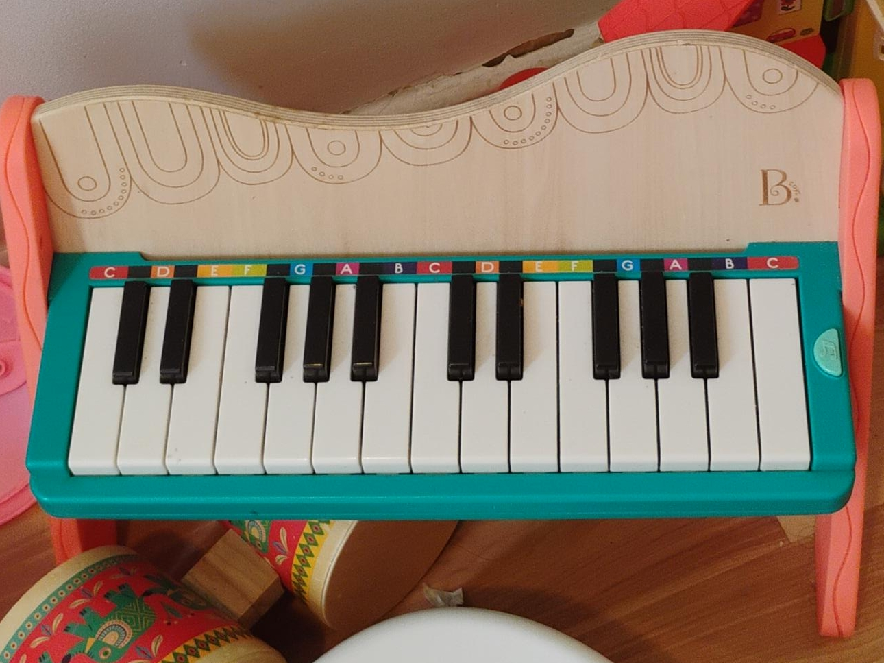 B. toys Wooden Toy Piano