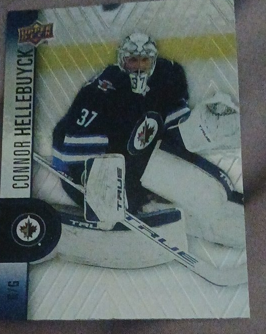 Connor Hellebuyck Upper Deck Hockey Card thumbnail
