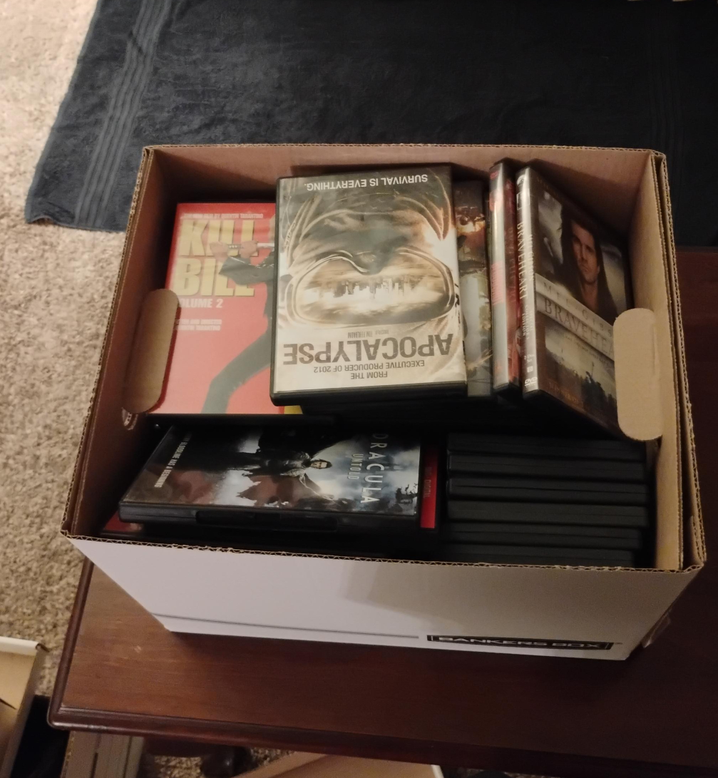 Box of DVDs - Mystery thumbnail