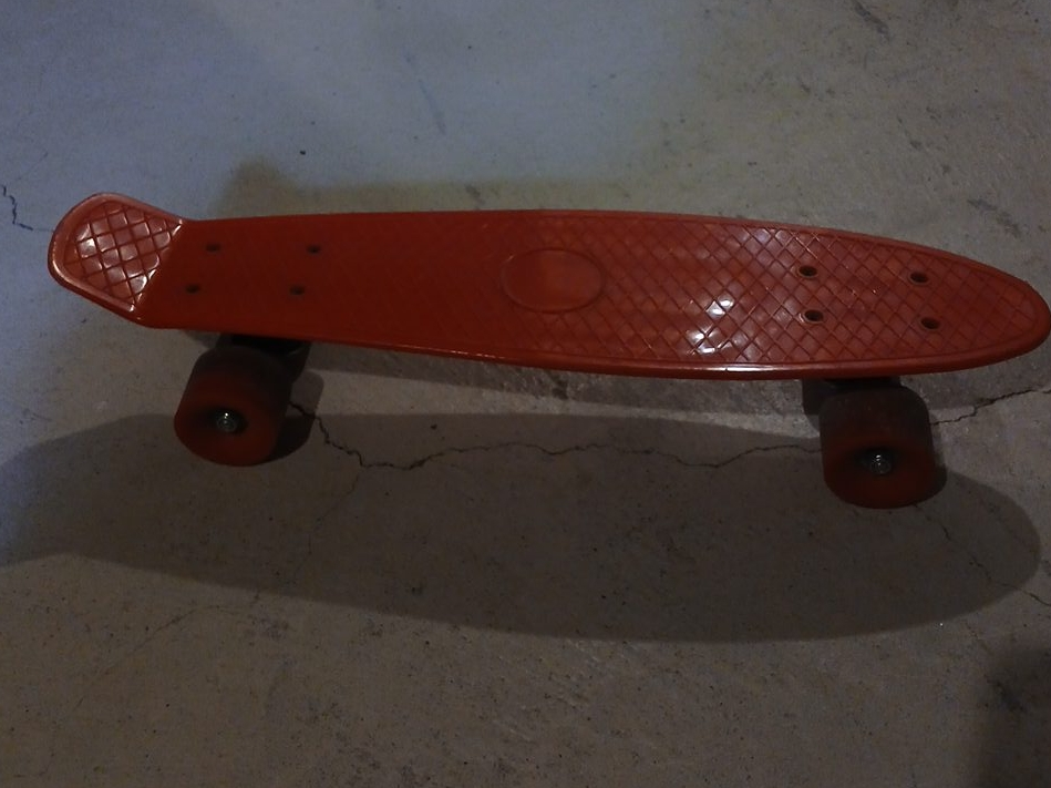 Red Penny Board Skateboard