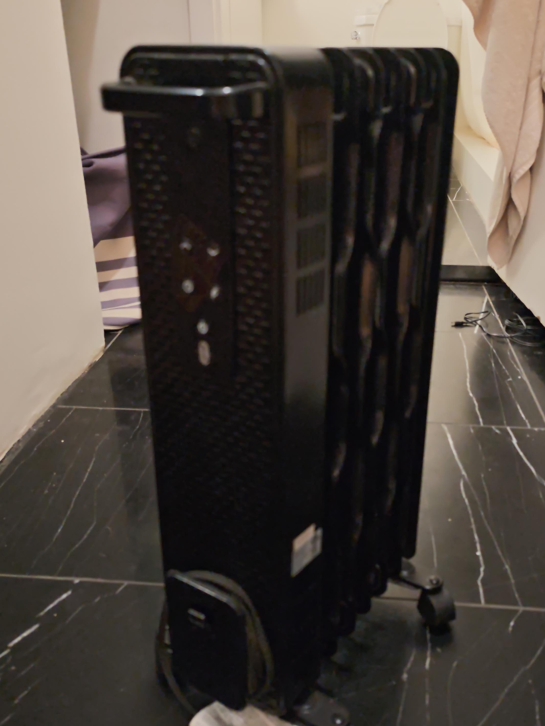 Black Oil-Filled Radiator Heater thumbnail