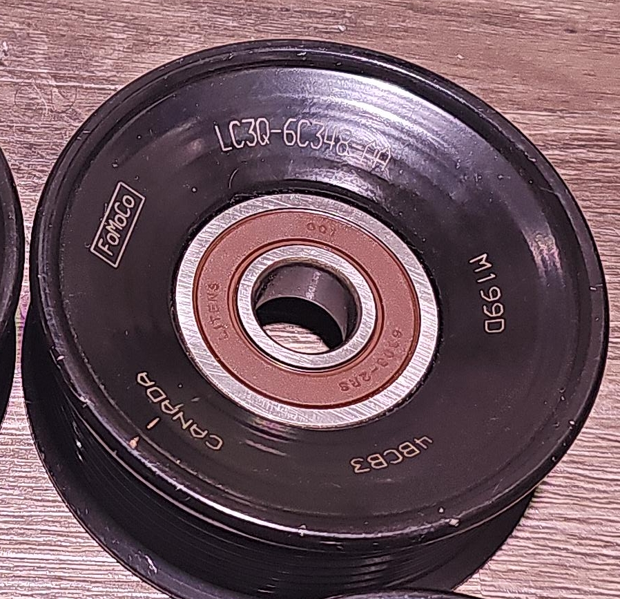Ford FoMoCo Idler Pulley LC3Q-6C348-AA thumbnail