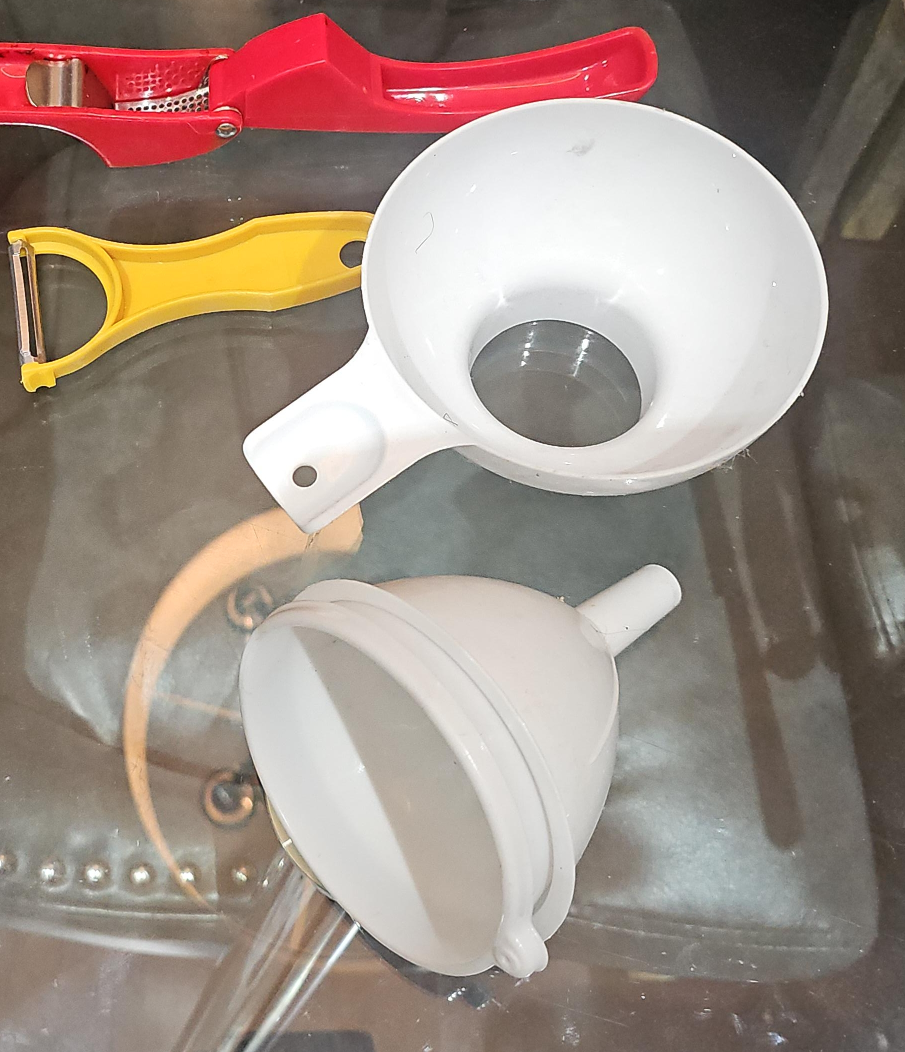 Kitchen tools: Funnels, Peeler, Garlic Press thumbnail
