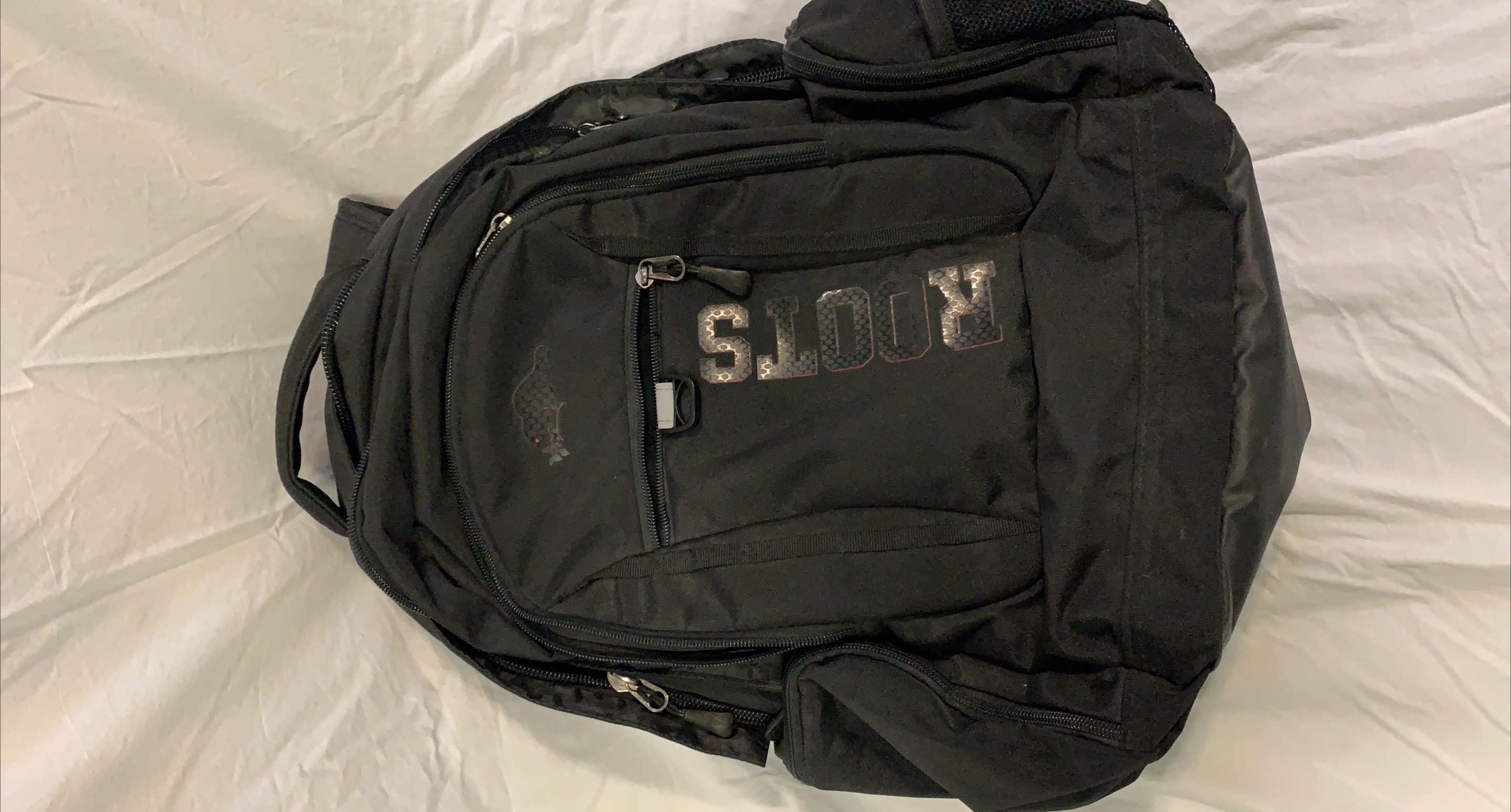 Roots Black Backpack 🥕