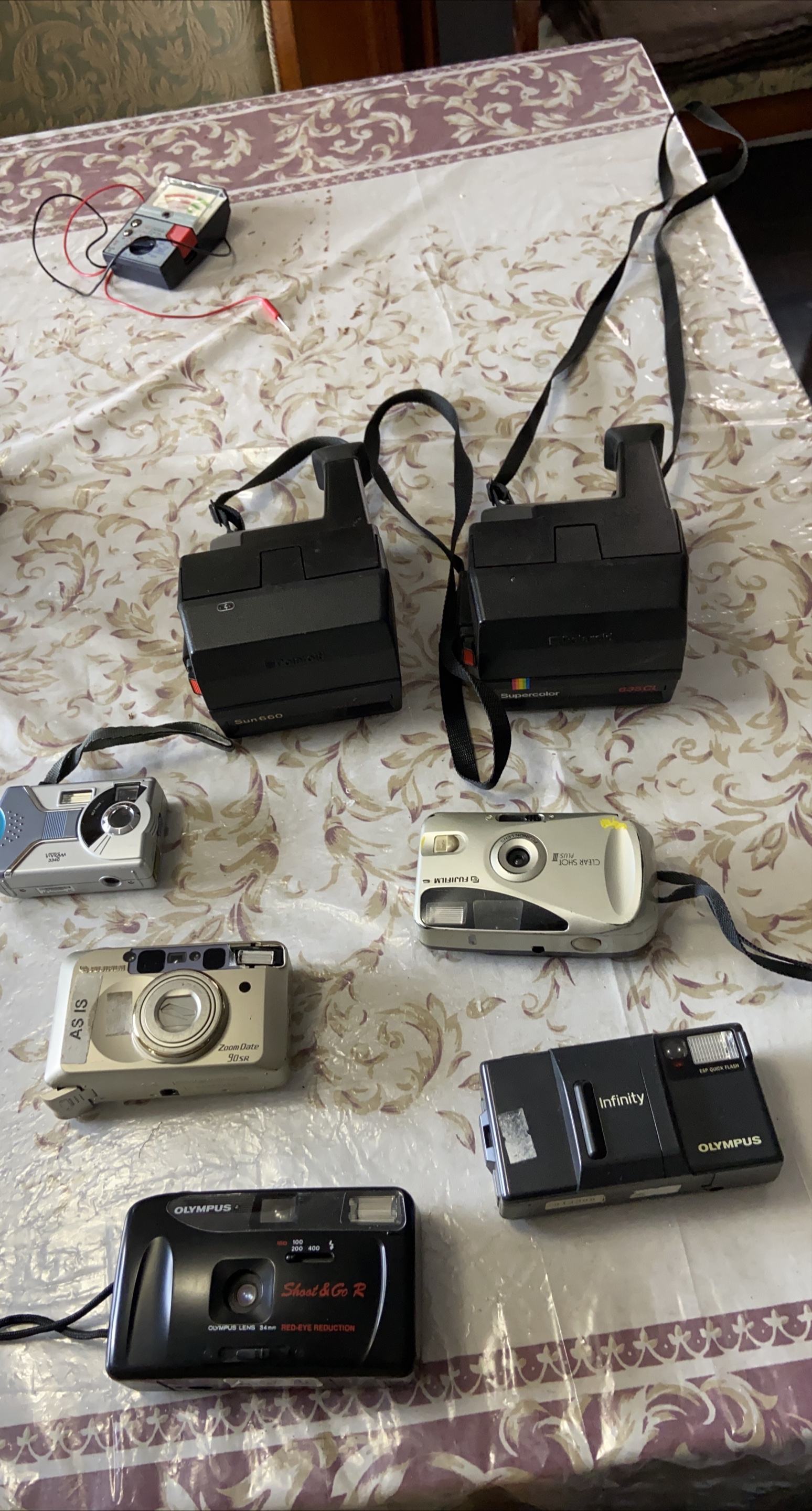 Vintage Polaroid & Olympus Film Cameras thumbnail